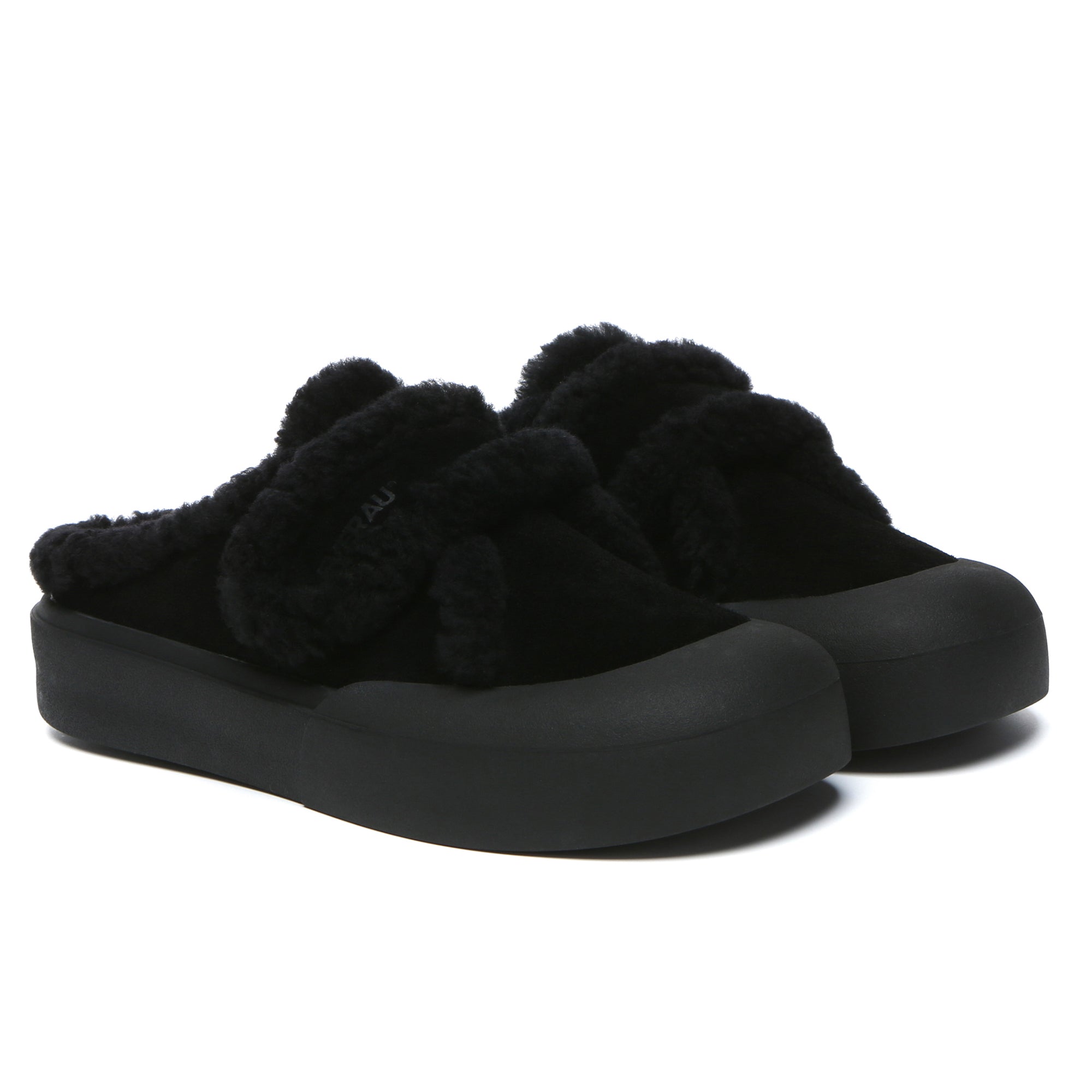 EverUgg women's adjustable shearling strap slippers with cozy sheepskin lining and slip-on design for comfortable indoor wear.