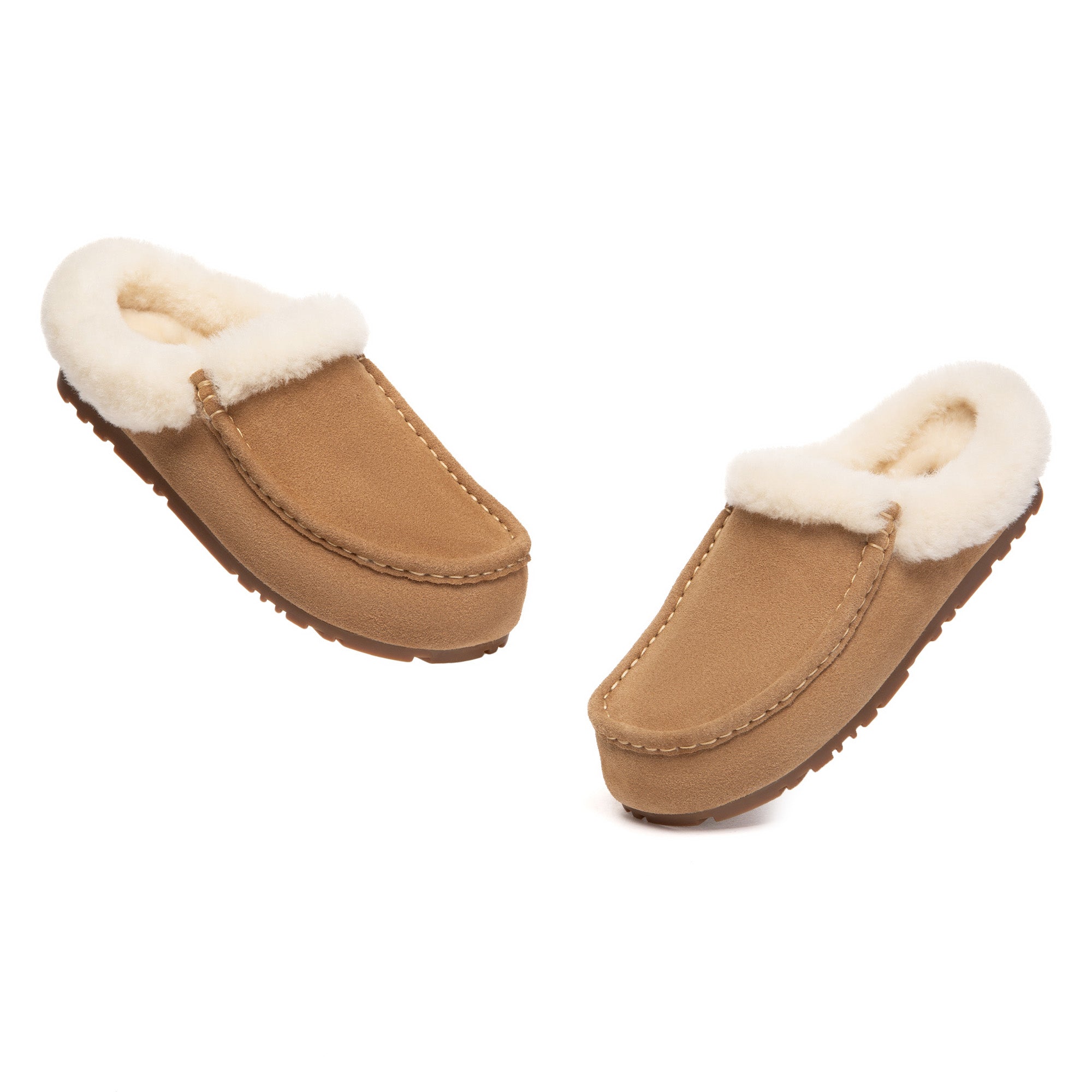 EverUgg ankle moccasin UGG slippers displayed on a foot, featuring soft leather and cozy interior for comfortable indoor wear.