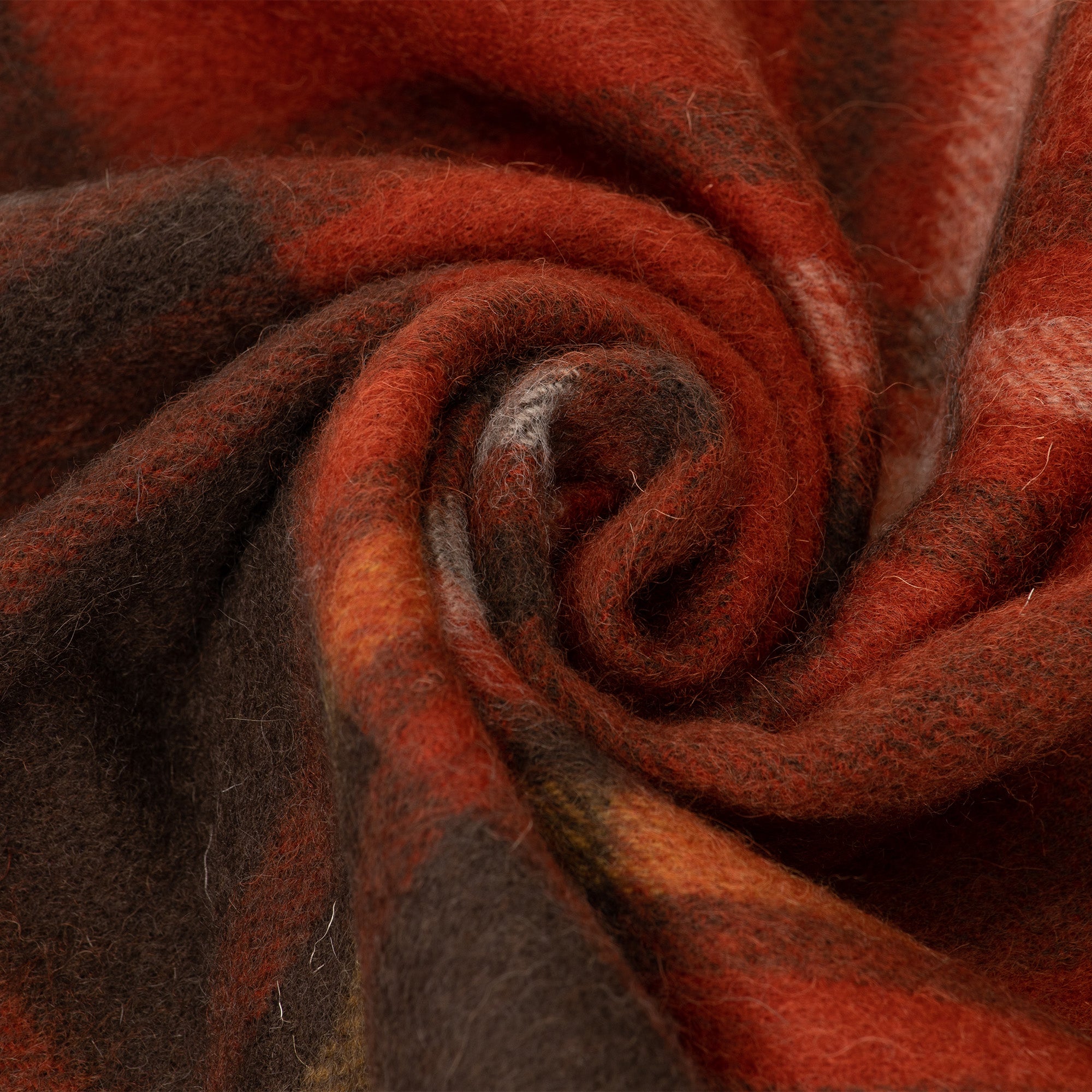 Orange-red Australian Merino Wool check scarf by EverUgg, soft and warm with a classic plaid pattern, draped over a neutral background.