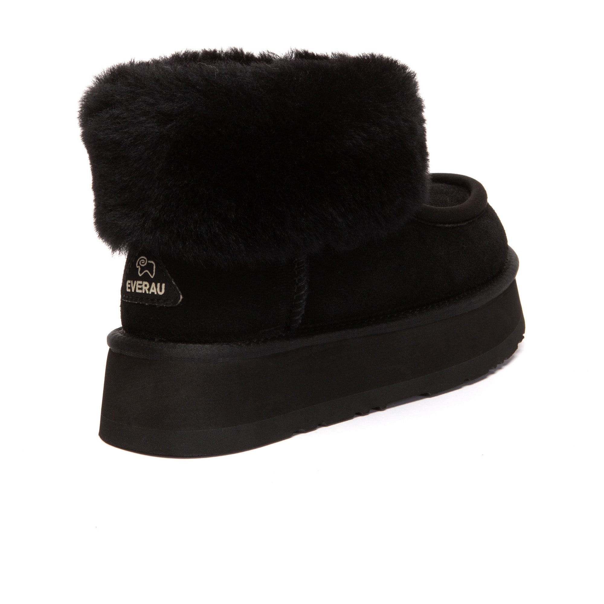 EverUgg Loofee UGG Boots in tan with plush shearling lining and rugged rubber sole, shown on a model's feet.