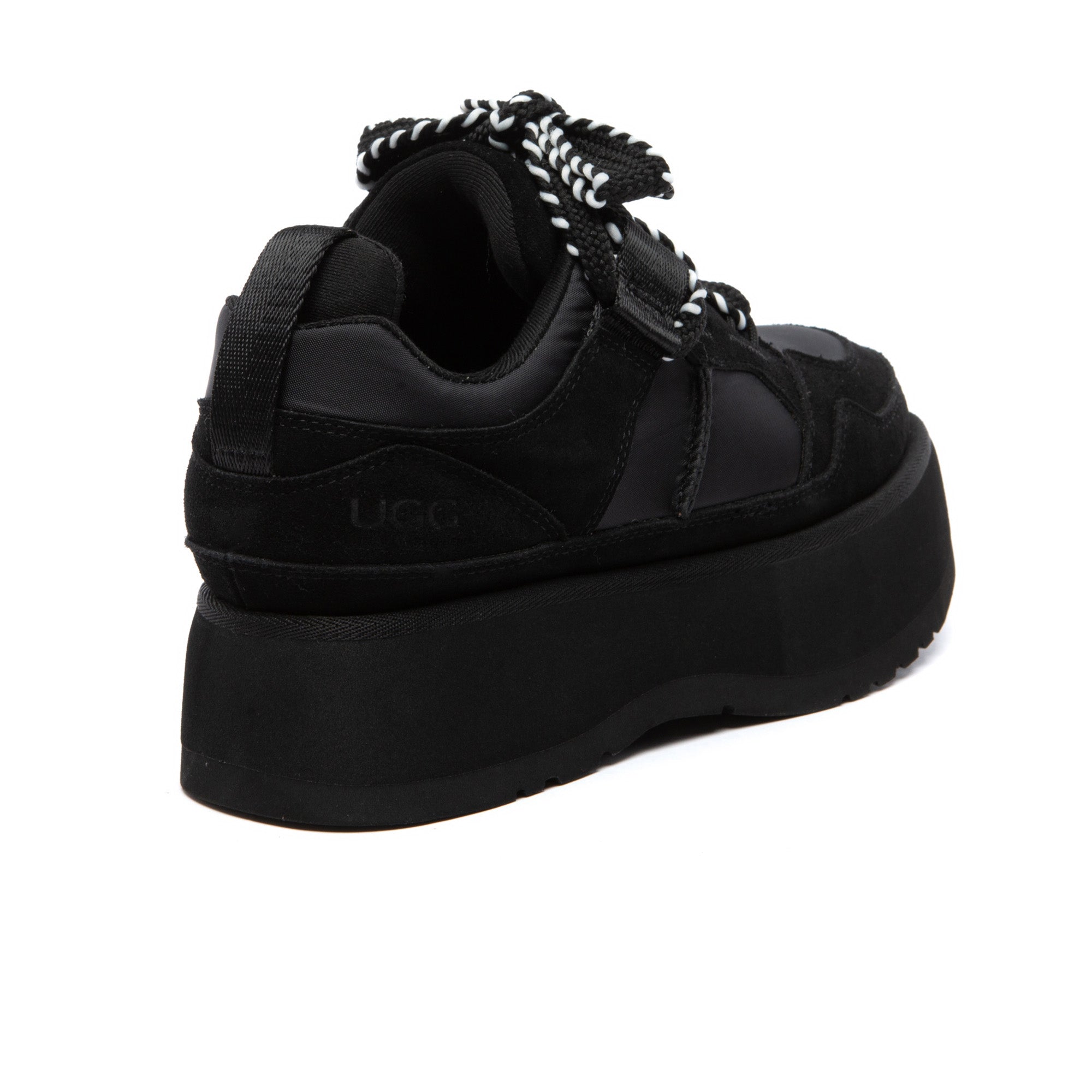 EverUgg Lowemel Platform UGG Sneakers showing beige canvas upper, white sole, and casual sneaker design