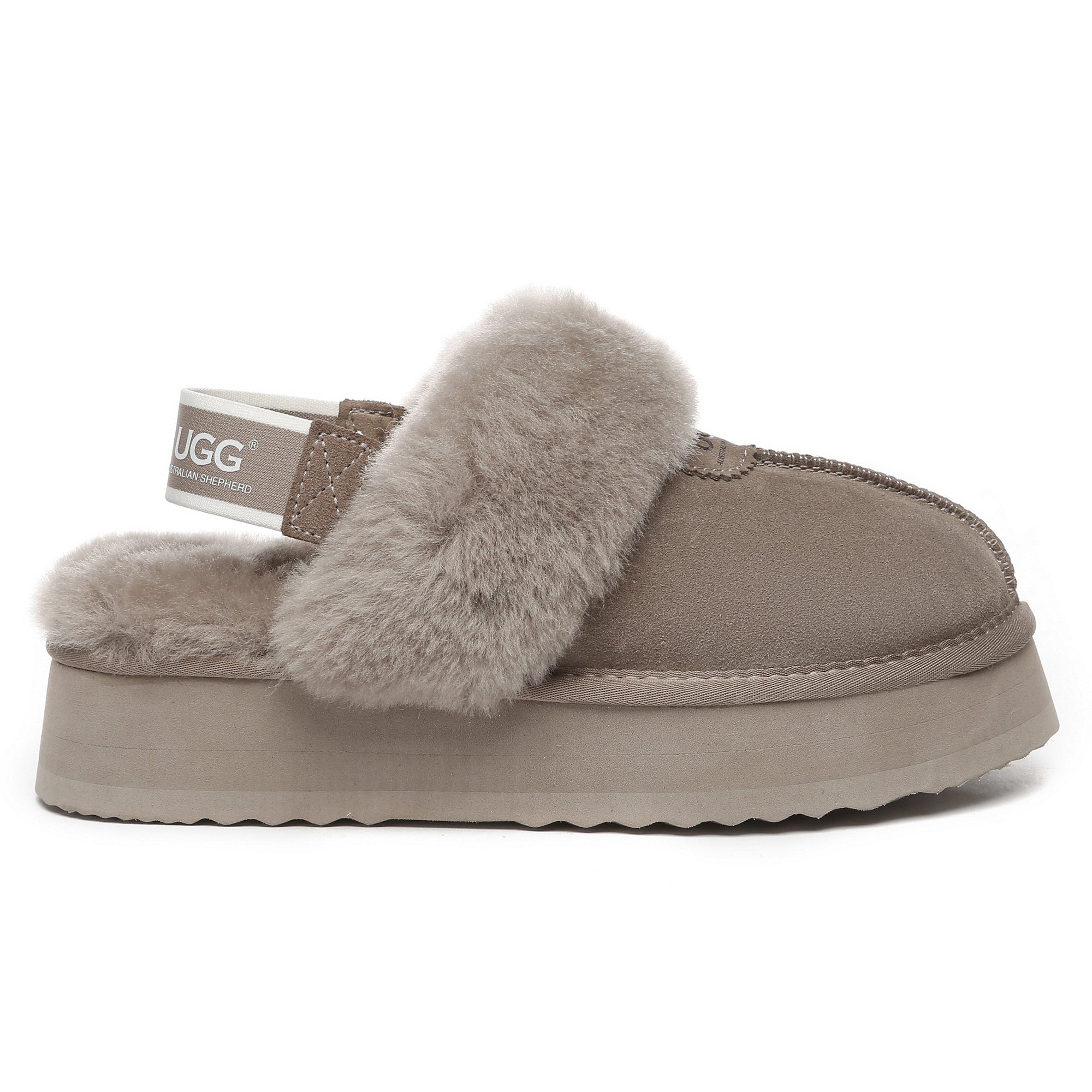 EverUgg Beta Platform UGG slippers featuring a plush material and thick sole, shown in a cozy indoor setting.