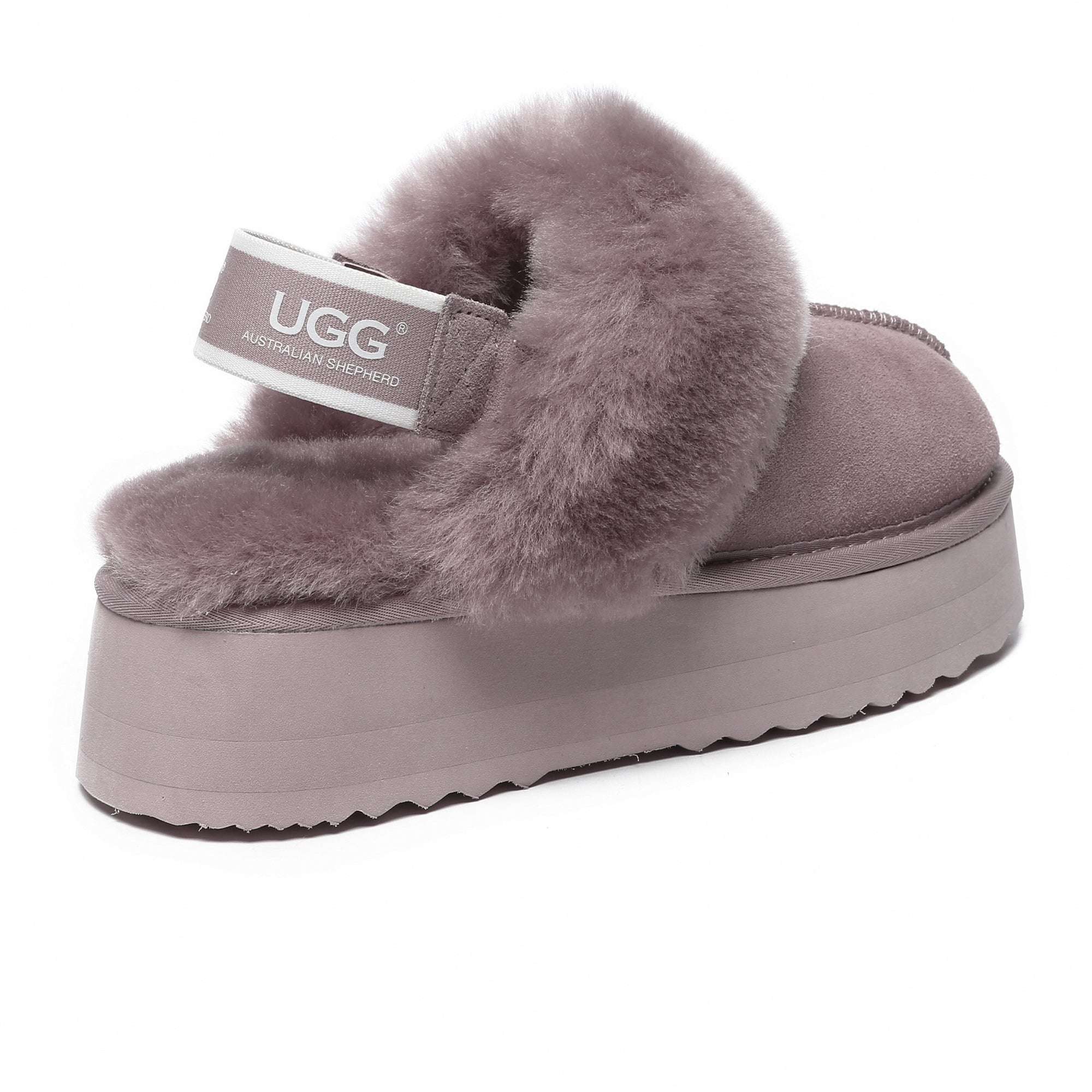 EverUgg Beta Platform UGG slippers featuring plush material, elevated platform sole, and cozy design for comfortable indoor wear.