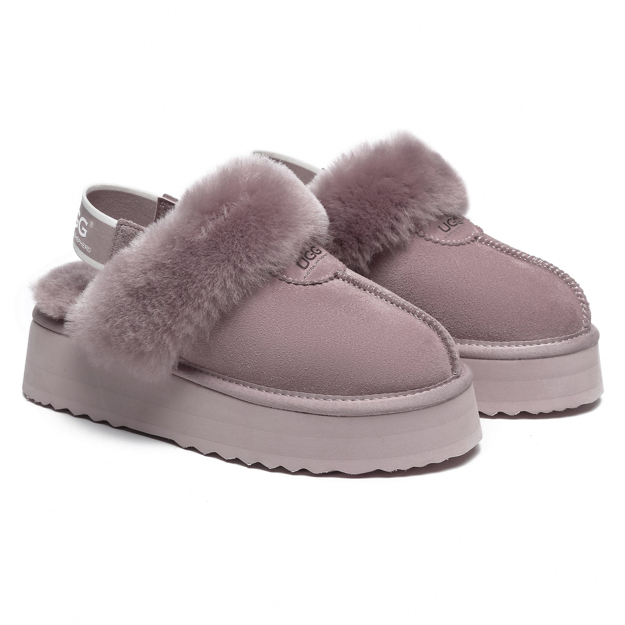 EverUgg Beta Platform UGG slippers with soft plush lining and thick sole, shown in a cozy indoor setting.