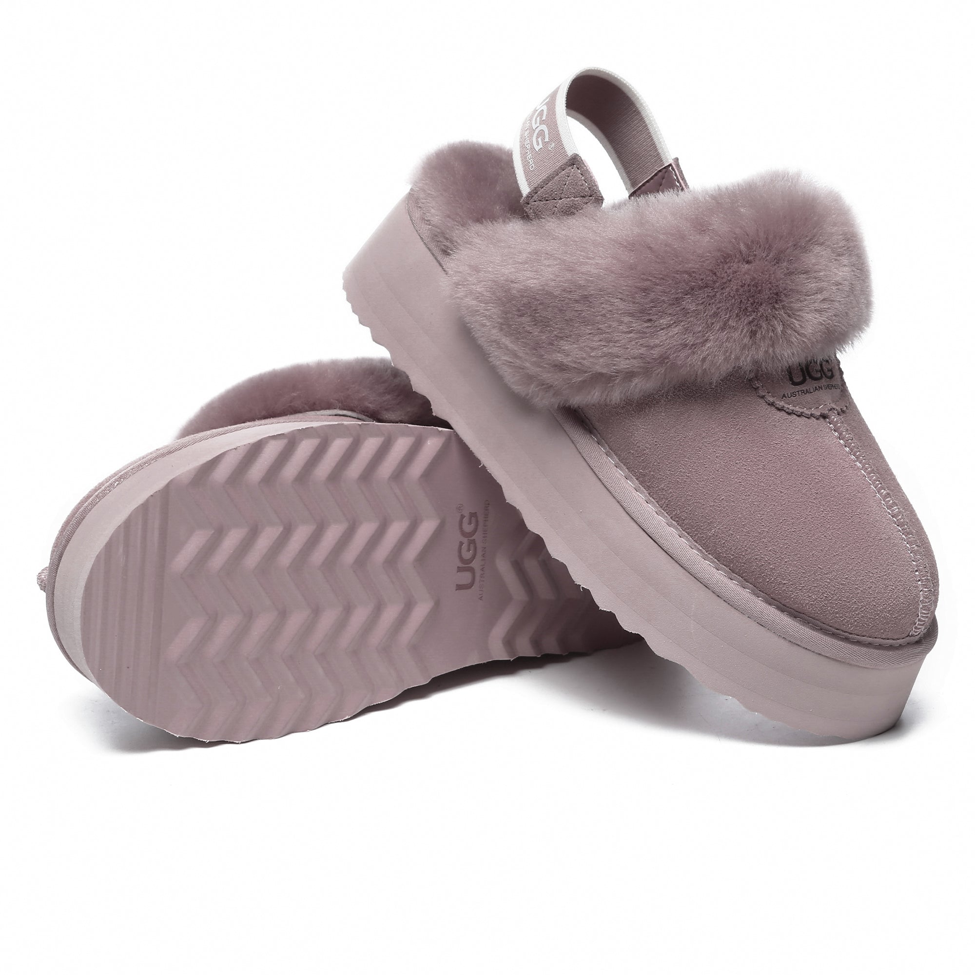 EverUgg Beta Platform UGG slippers with plush lining and thick sole, shown in a cozy indoor setting.