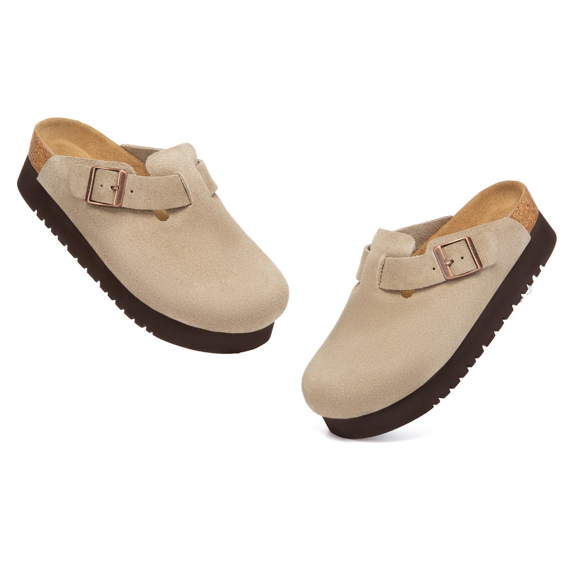 EverUgg Birkie Suede Buckle Platform Clogs slippers with buckle detail and chunky platform sole, shown in a close-up angle.