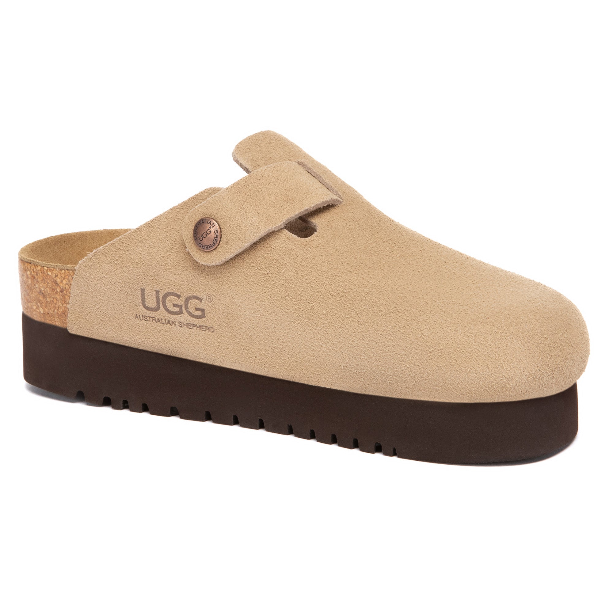 EverUgg Birkie Suede Buckle Platform Clogs slippers with buckle detail and platform sole, shown in a cozy indoor setting.