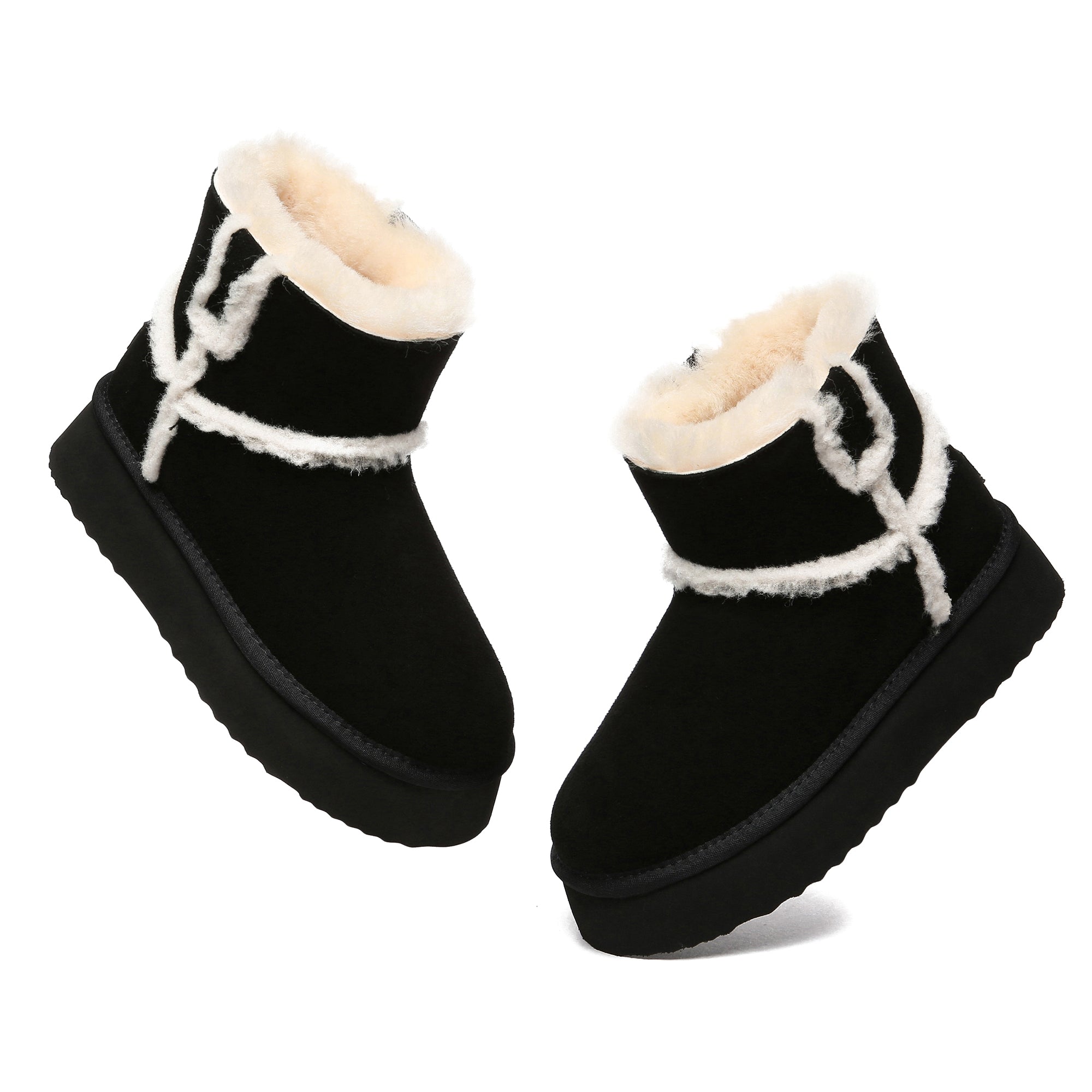 Black Bronte women’s platform UGG boots by EverUgg with chunky soles and cozy shearling lining, shown from the front view.