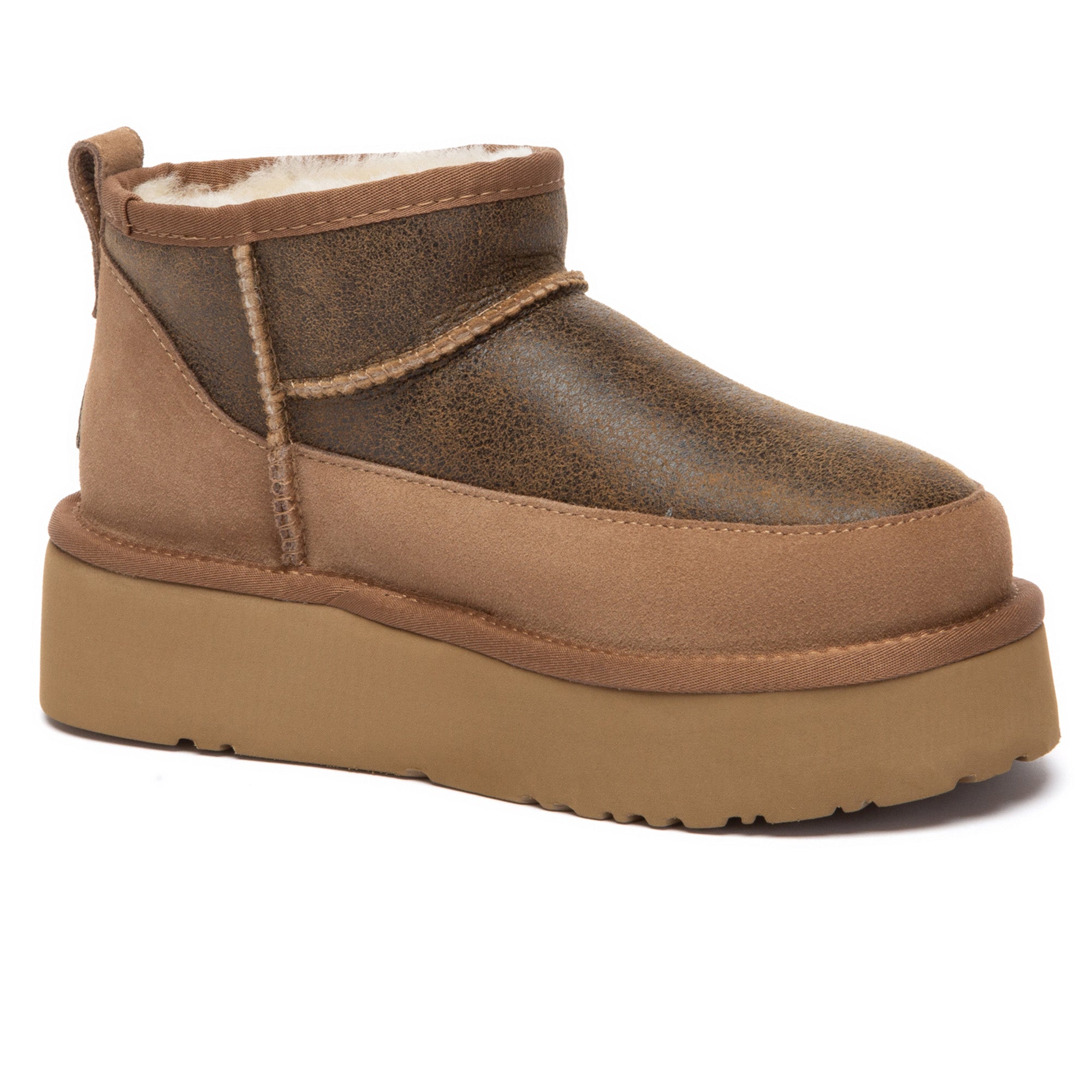 EverUgg Earlova UGG boots in cozy, plush shearling with tan leather exterior, stylish and warm footwear for cold weather.