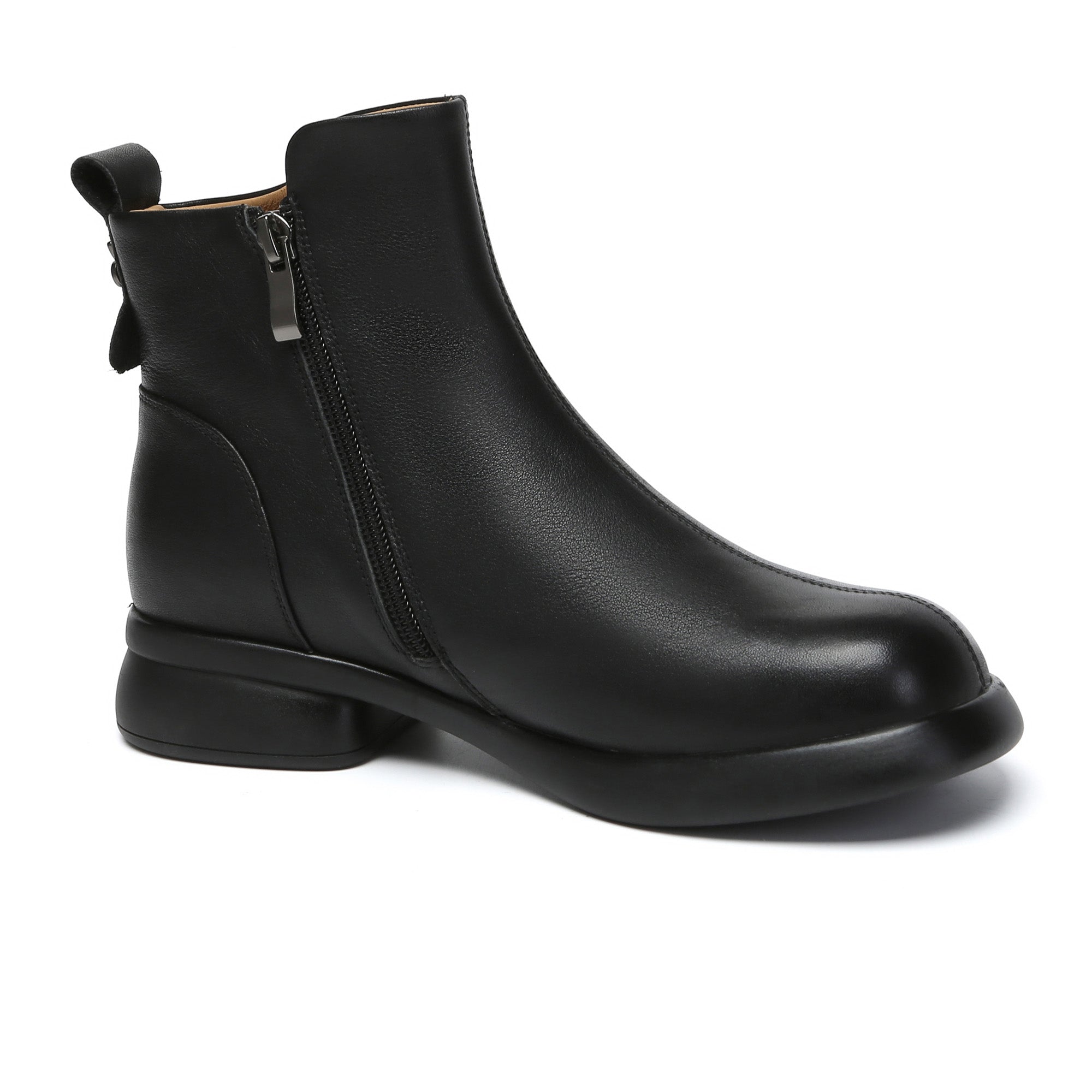 EverUgg Caroline leather zip ankle boots featuring sleek design and sturdy heels, perfect for stylish everyday wear.