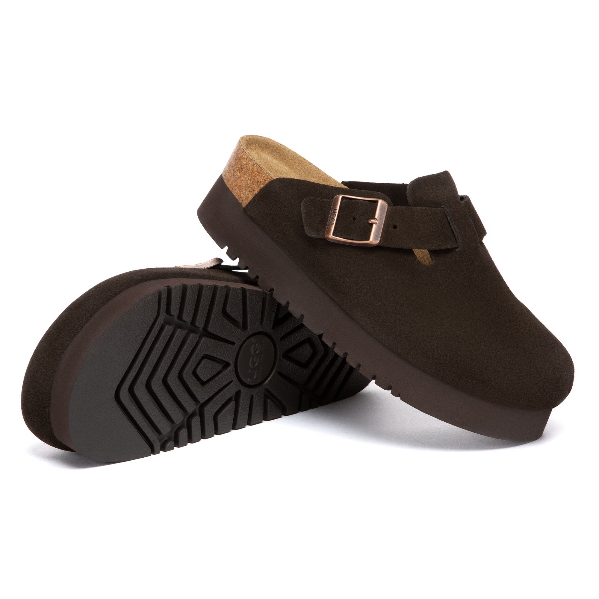 EverUgg Birkie Suede Buckle Platform Clogs slippers with buckle detail and platform sole, shown in a natural indoor setting.