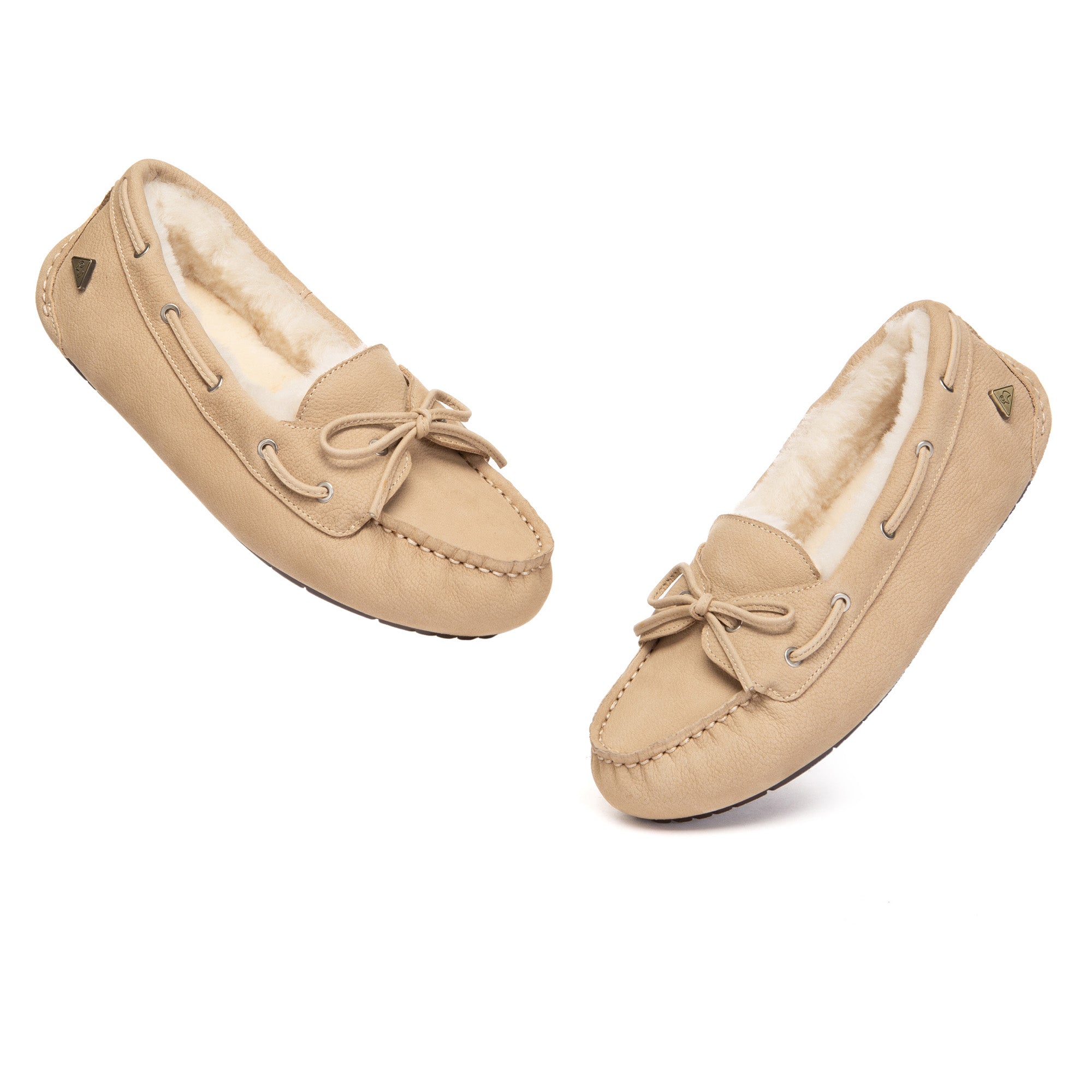 EverUgg Classic Bow Moccasins Slippers featuring soft leather, bow detail, and comfortable moccasin design for cozy indoor wear.