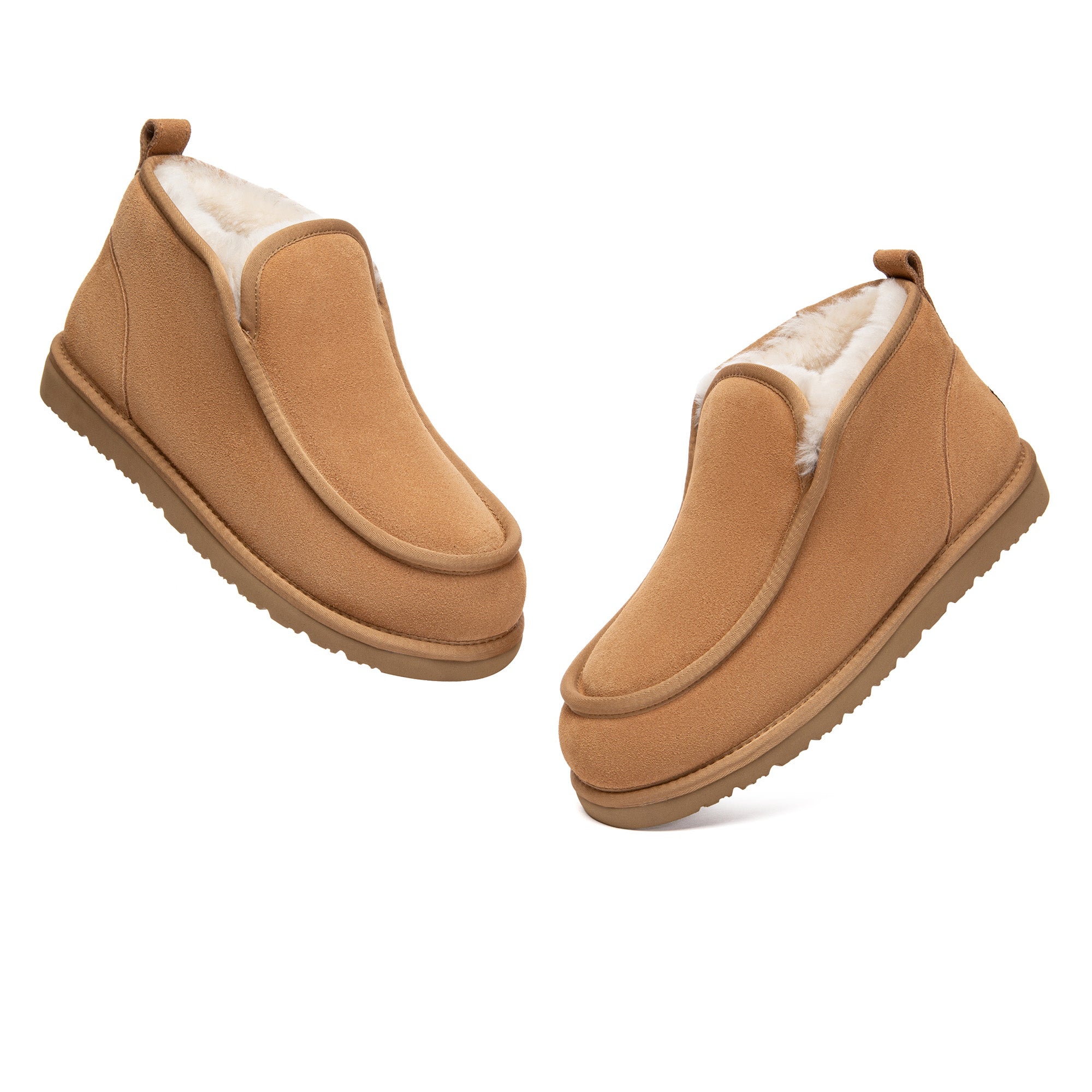 Close-up of classic mini ankle UGG boots by EverUgg, showing soft suede material and cozy sheepskin lining.