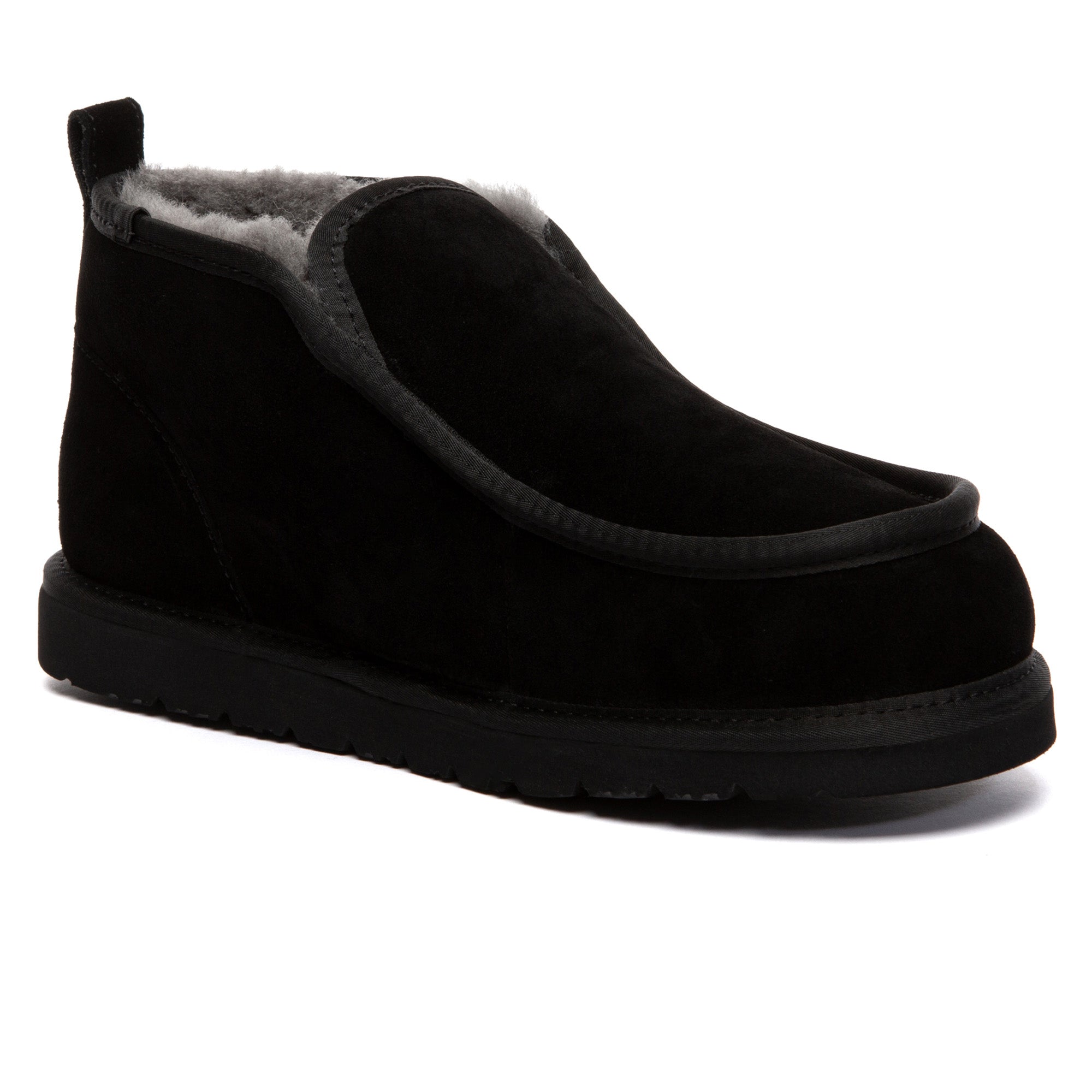 EverUgg Classic Mini Ankle Boots in tan with plush sheepskin lining, showcasing the stylish and cozy footwear design.