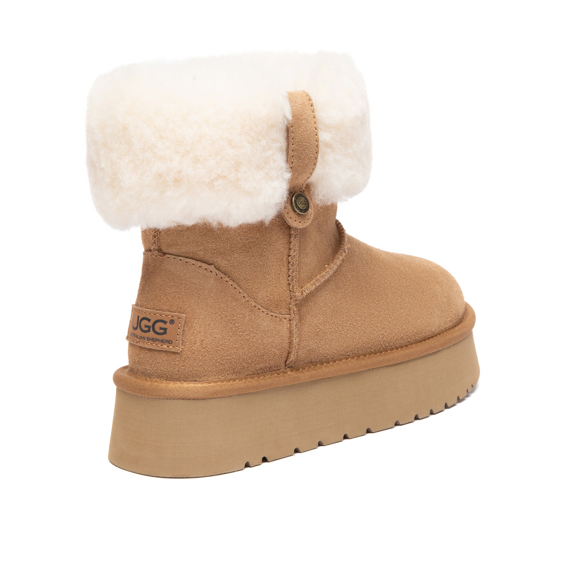 Eleni pull-on mini UGG boots by EverUgg featuring soft suede material and cozy shearling lining, shown in a side view.