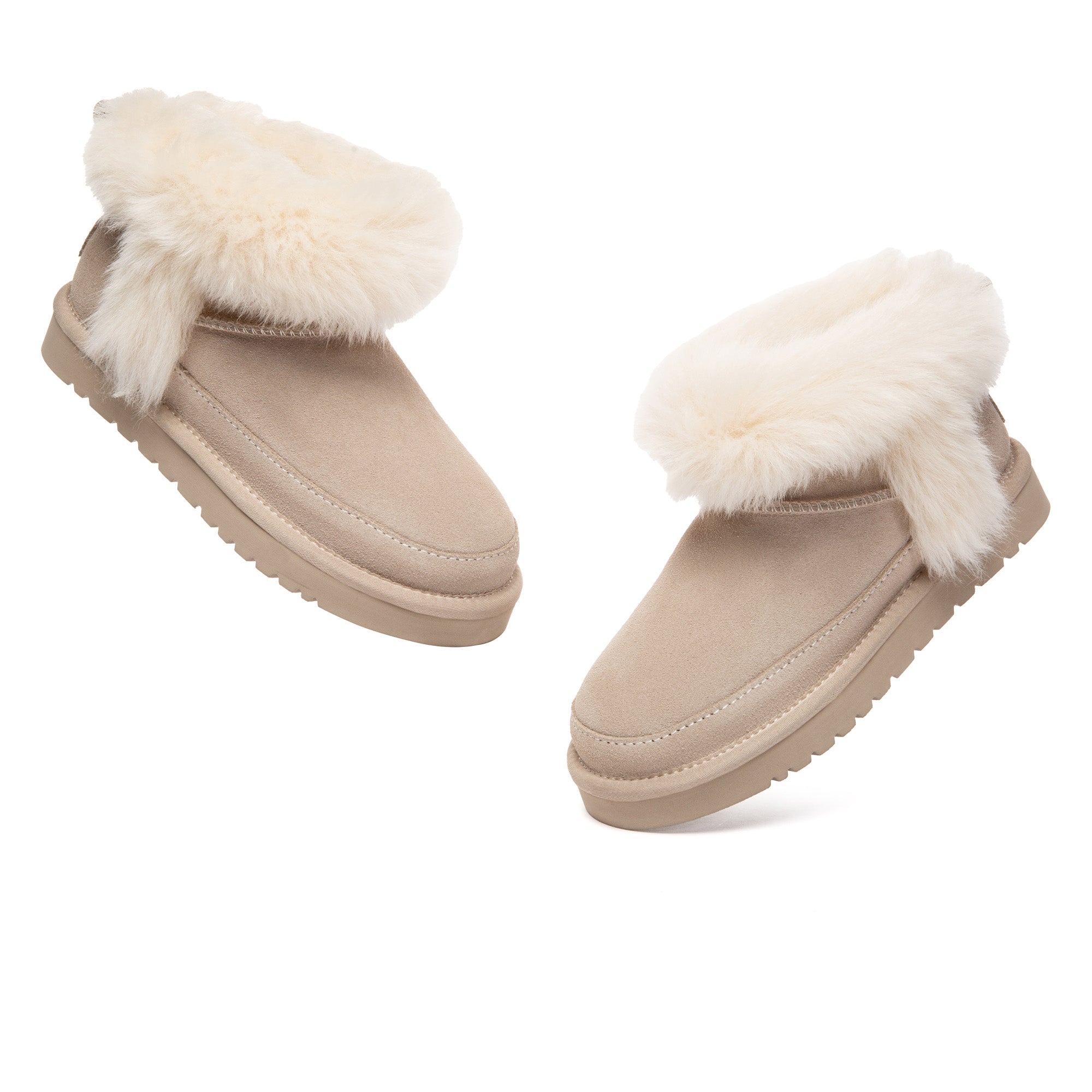 EverUgg Frovi Ultra Mini UGG Boots, cozy sheepskin-lined ankle boots with a plush exterior and durable sole, perfect for cold weather.