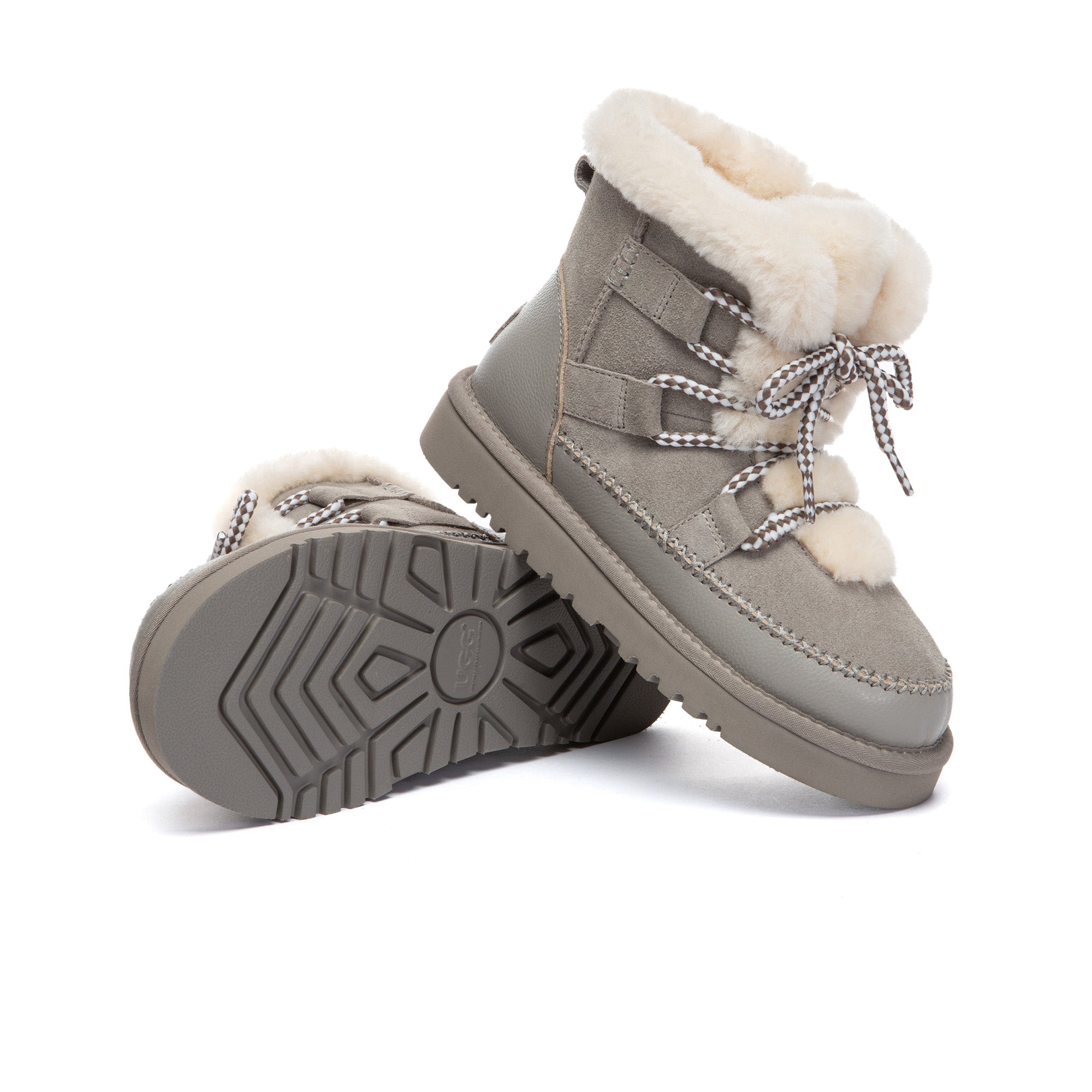 EverUgg Elvora UGG boots in neutral color with plush fur lining and slip-on design, perfect for cozy winter wear.