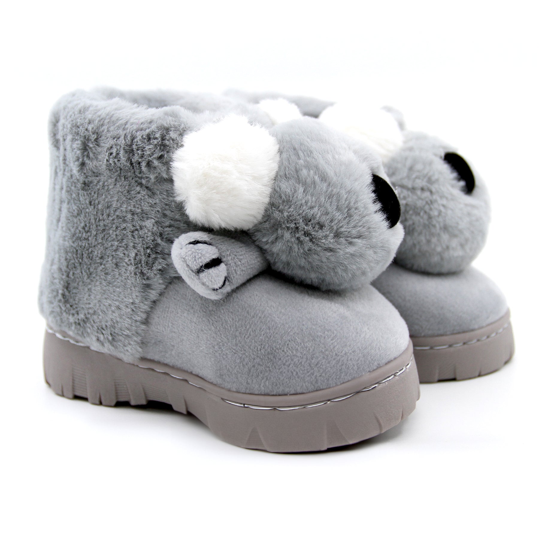 Kids' Shearers UGG boots featuring a cute koala design with soft suede material and cozy lining for fashionable comfort.
