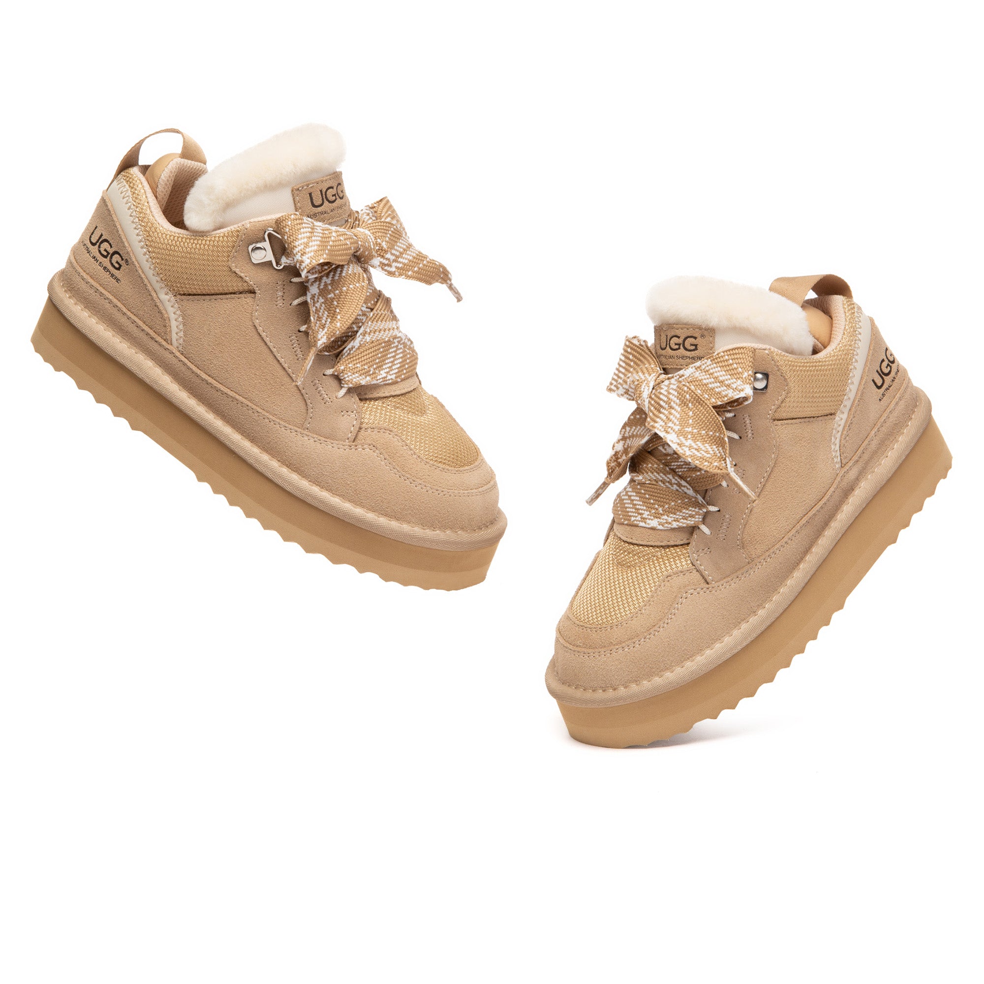 Kids' UGG platform lace-up boots by EverUgg featuring a stylish design with sturdy soles and comfortable fit.