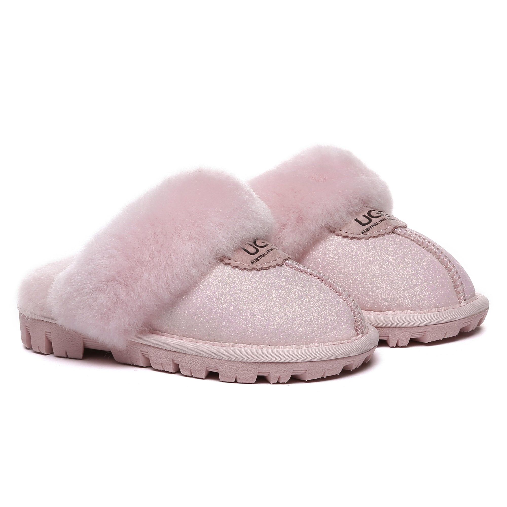 Kids sparkle UGG slippers in pink with glitter accents, soft plush interior, and slip-on style from EverUgg.