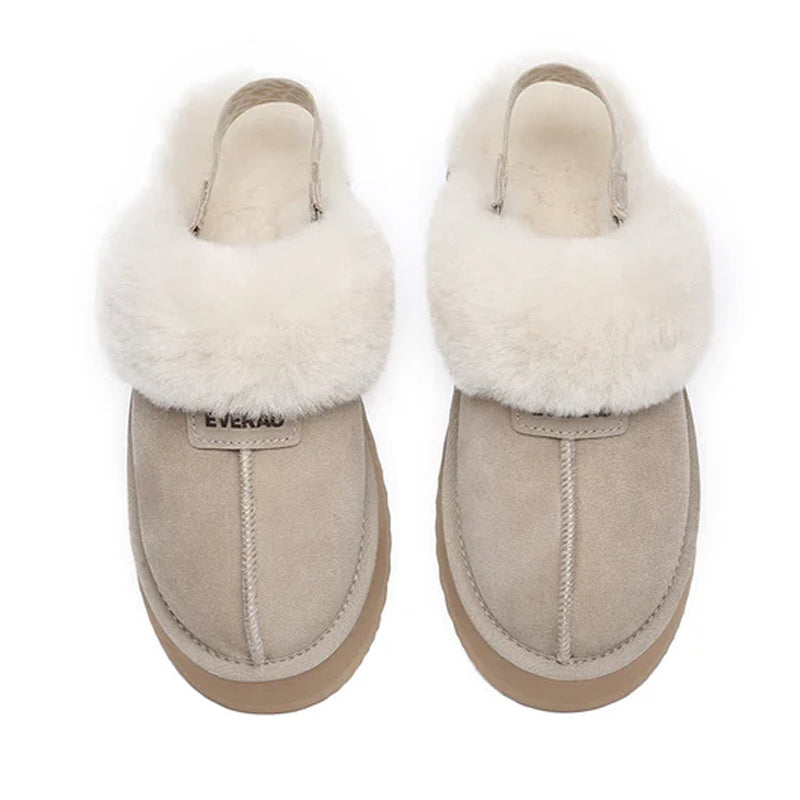 EverUgg Kirra Platform slippers with beige straps and thick sole, showcasing a stylish and comfortable footwear design.