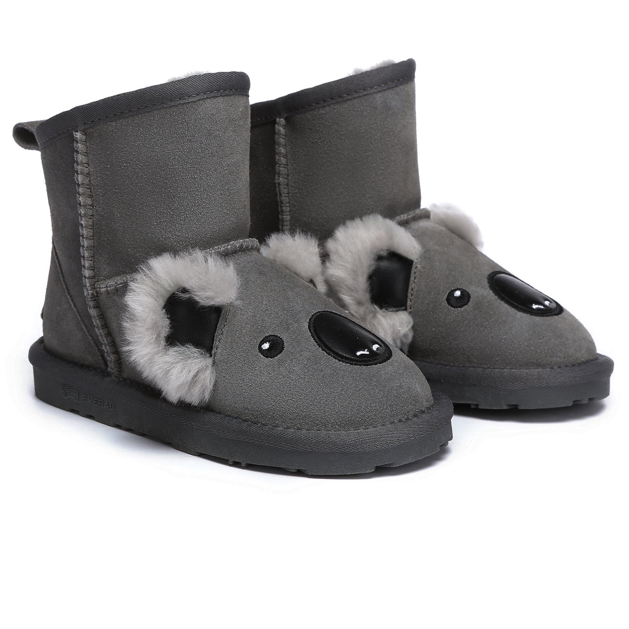 Kids UGG boots by EverUgg featuring cozy sheepskin lining and brown leather exterior, suitable for children.