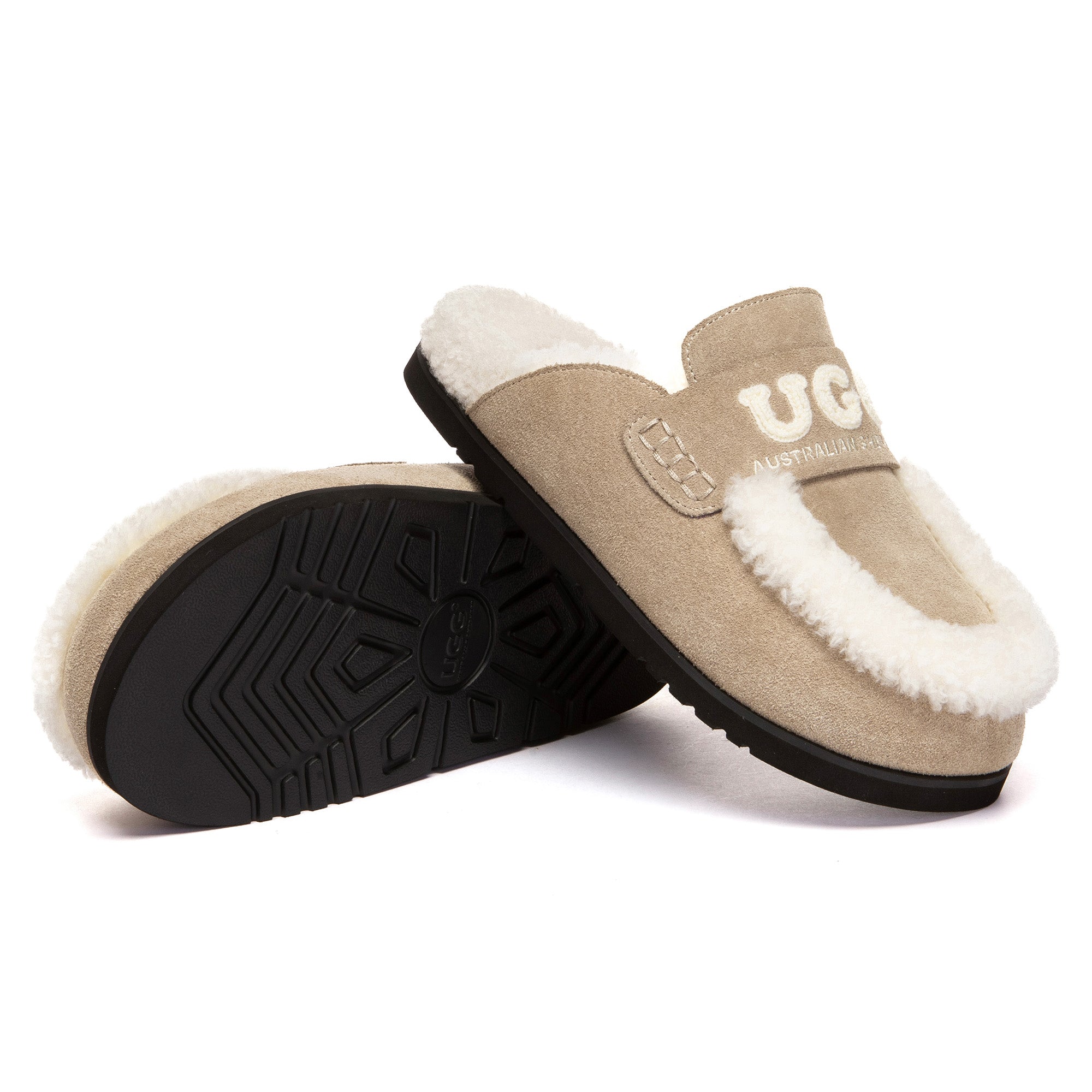 EverUgg Laura shearling logo slippers with plush interior and cozy design, featuring UGG branding and soft shearling material.