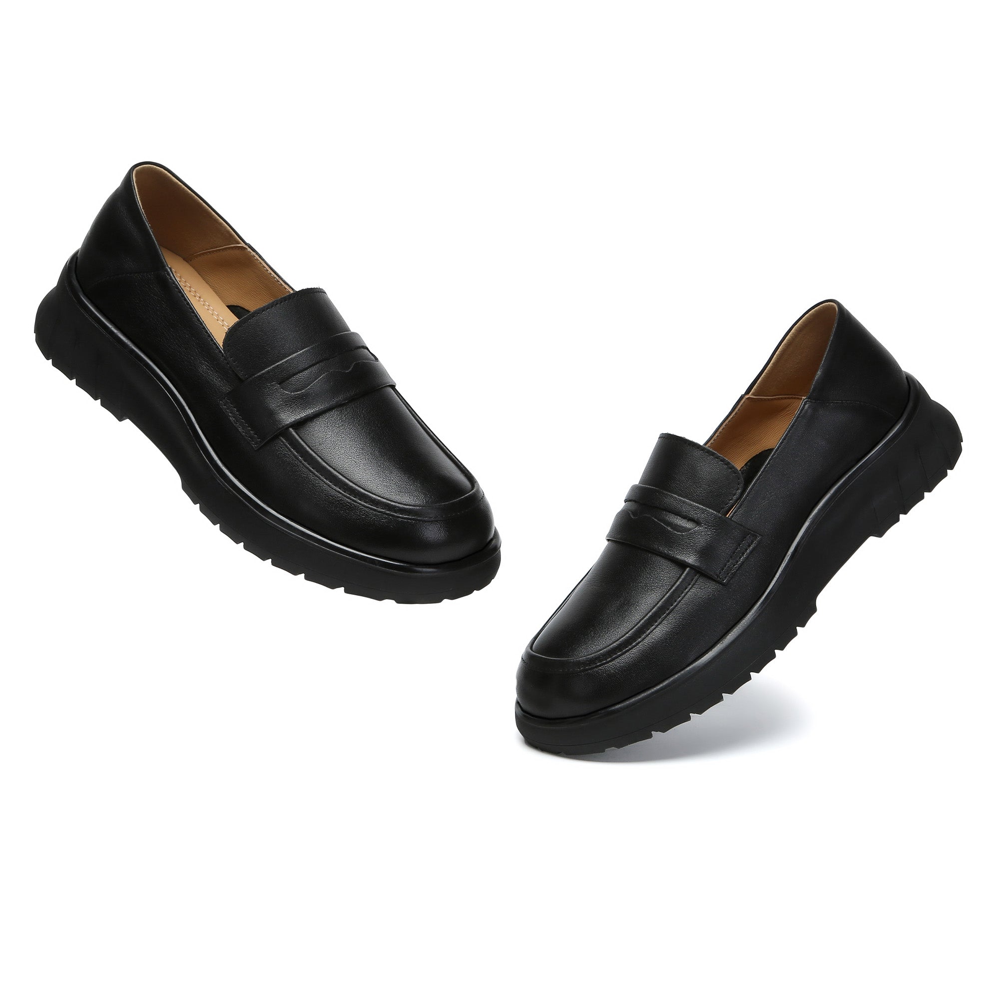 EverUgg leather slip-on loafer showing a classic tan design with smooth leather finish and casual slip-on style.