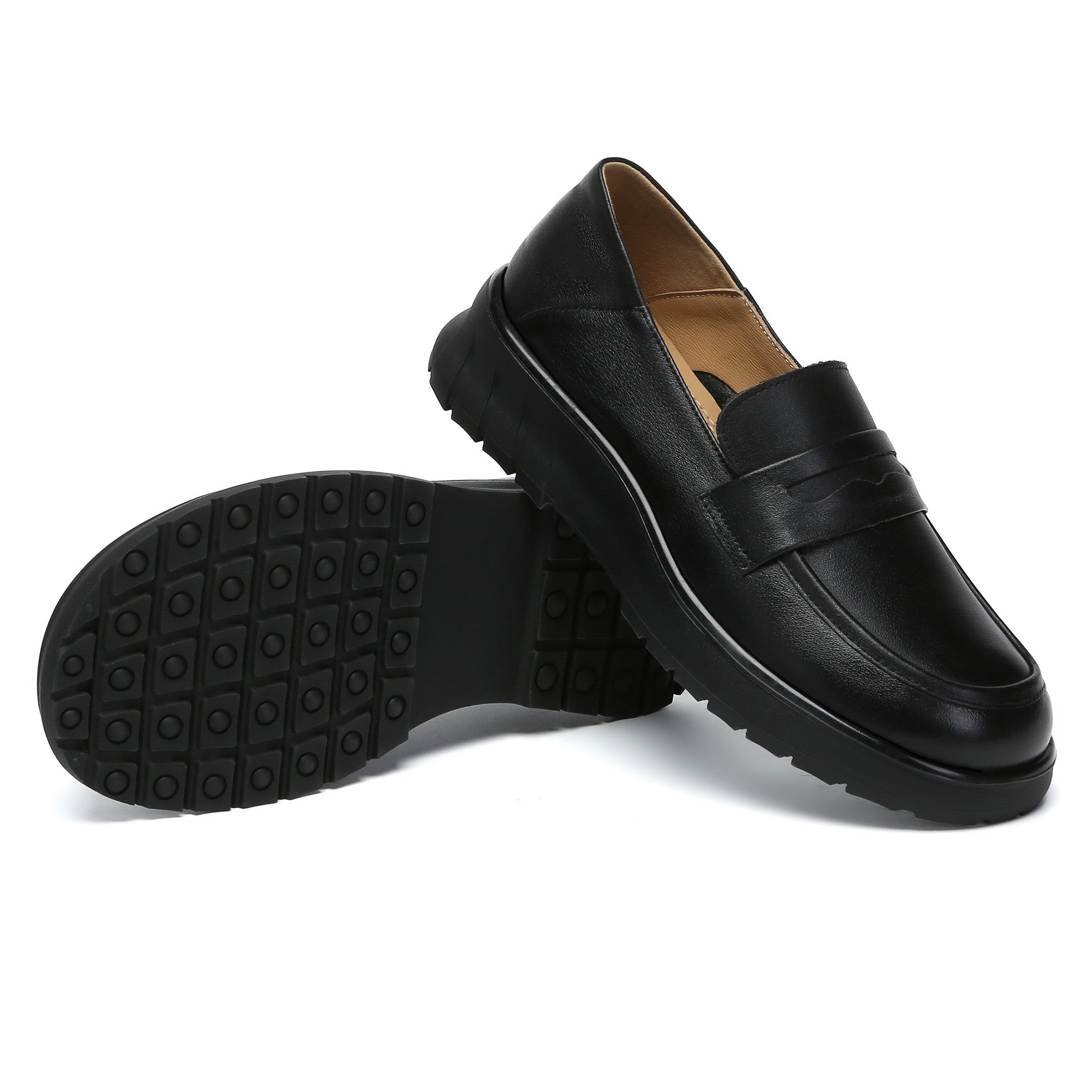 EverUgg leather slip-on loafer showing sleek, classic design with smooth black leather and a comfortable low heel.