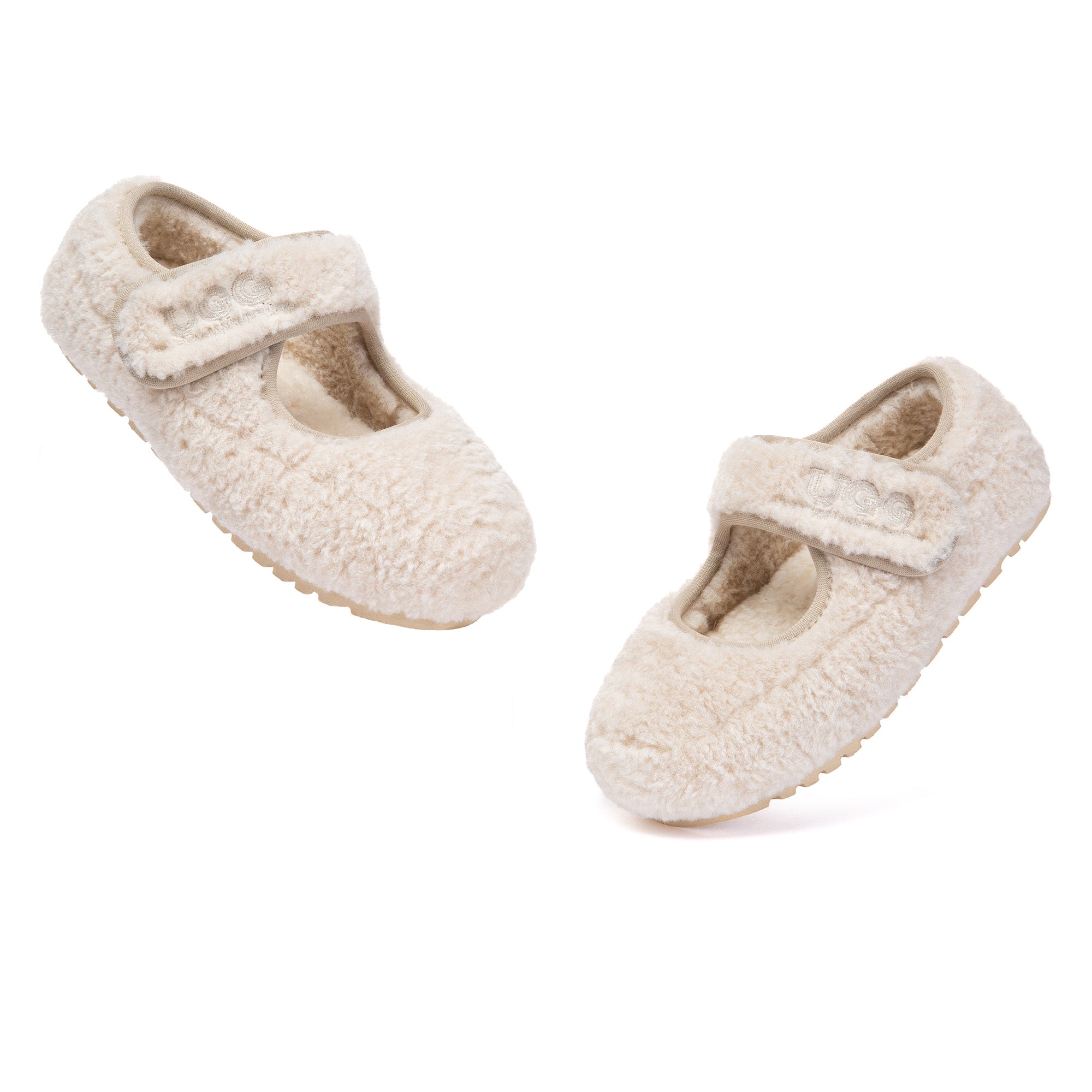 Kids Mary Jane TeddyCozy UGG slippers in soft plush with a classic design, perfect for comfortable indoor wear.
