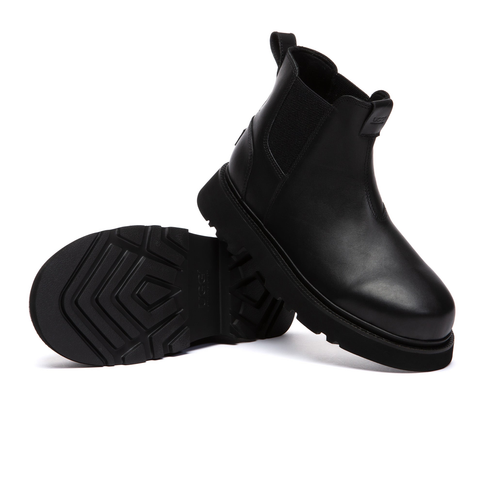 Men's black Chelsea leather boots by EverUgg featuring sleek design and elastic side panels, perfect for stylish footwear.