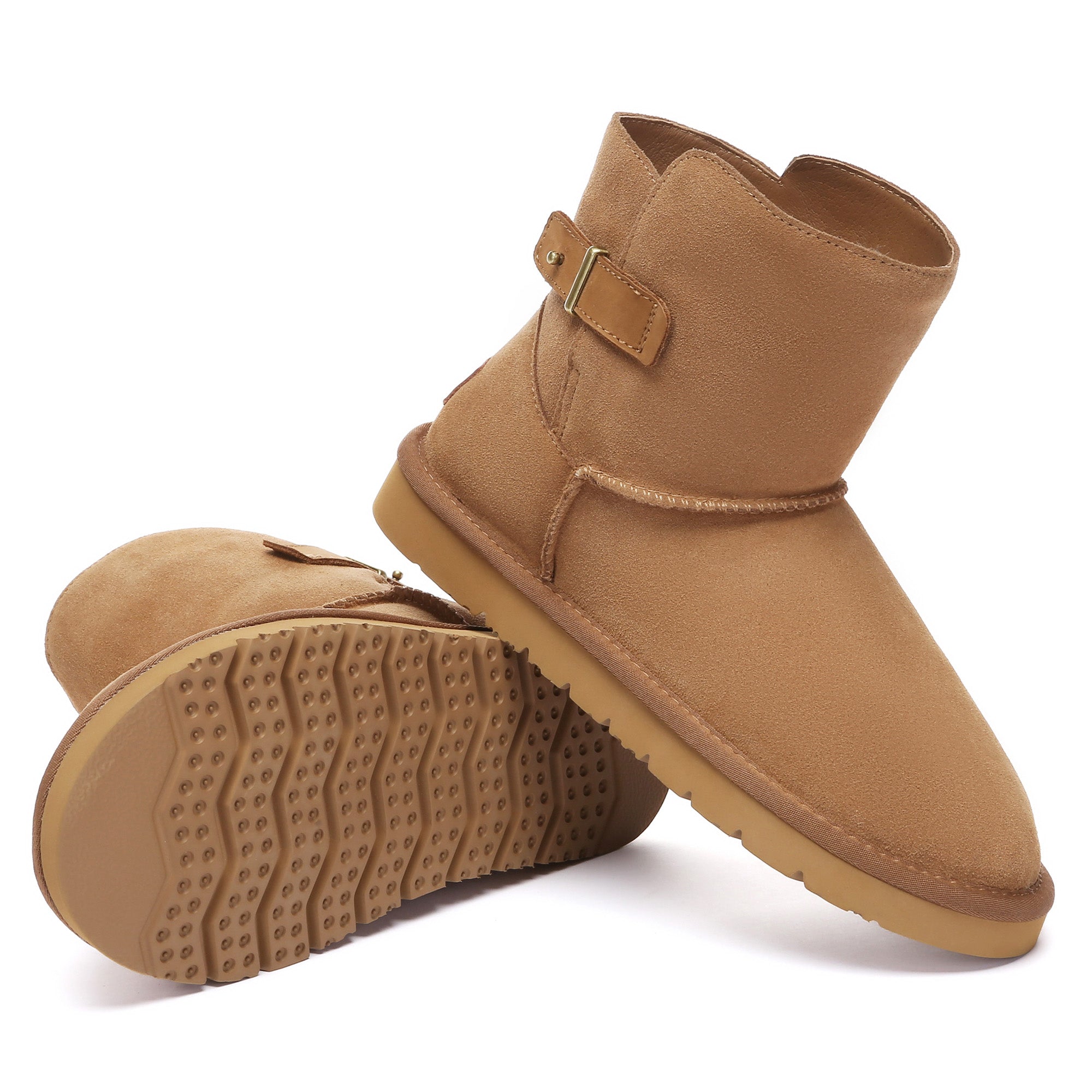 Mid-calf EverUgg buckle mini classic UGG boots with buckle accents, soft suede material, and rugged sole for casual winter wear.