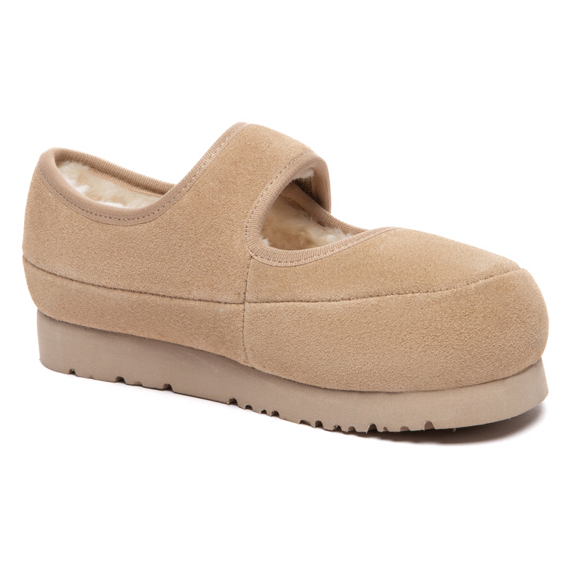 Kids' Millie Mary Jane UGG slippers in soft pink with plush lining, featuring adjustable straps and UGG branding for comfortable wear.