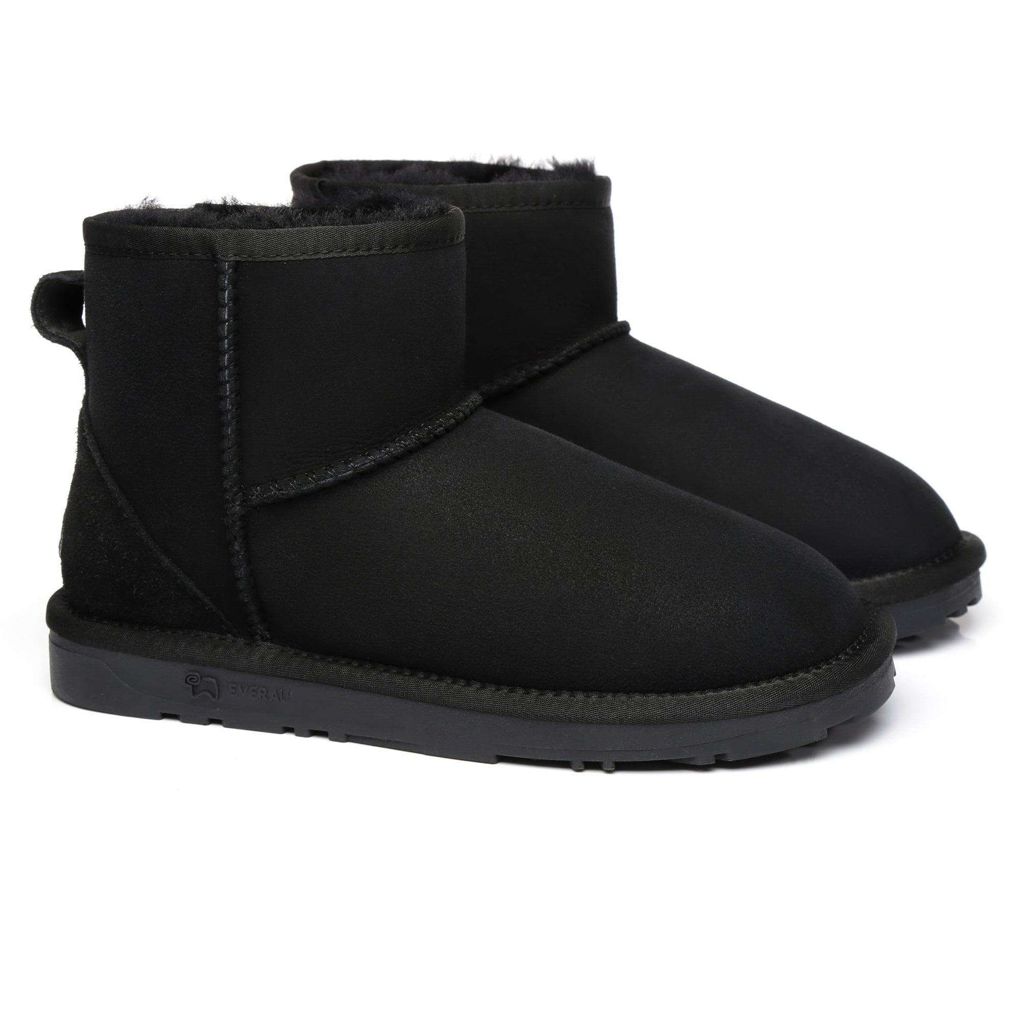 Close-up of EverUgg Mini Classic Sheepskin UGG Boots for women, showcasing soft sheepskin material and cozy design.