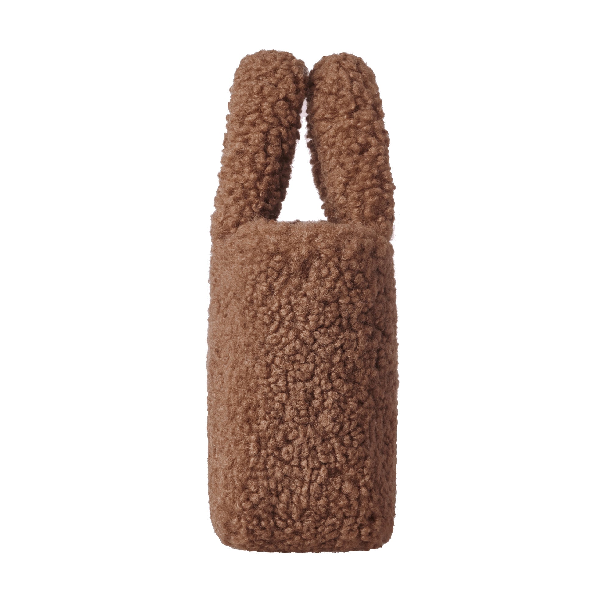 Mini Teddy UGG handbag in soft beige with UGG branding, featuring a plush teddy bear design and compact, stylish handbag shape.