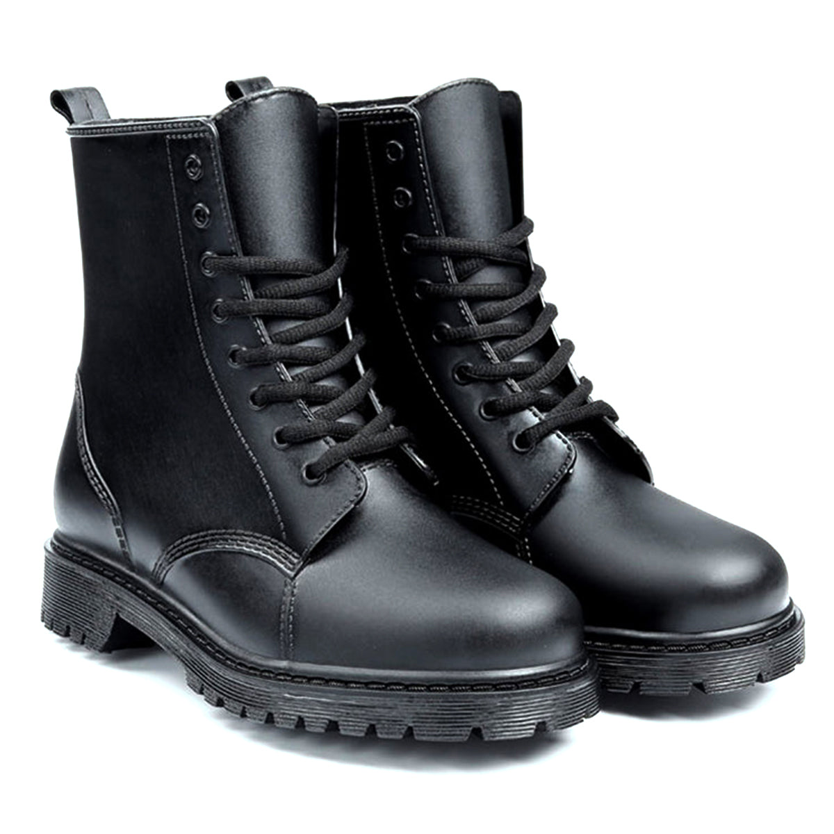 AllSlides Nomad Black waterproof boots with sturdy design, shown in rainy weather with water-resistant material and slip-resistant soles.