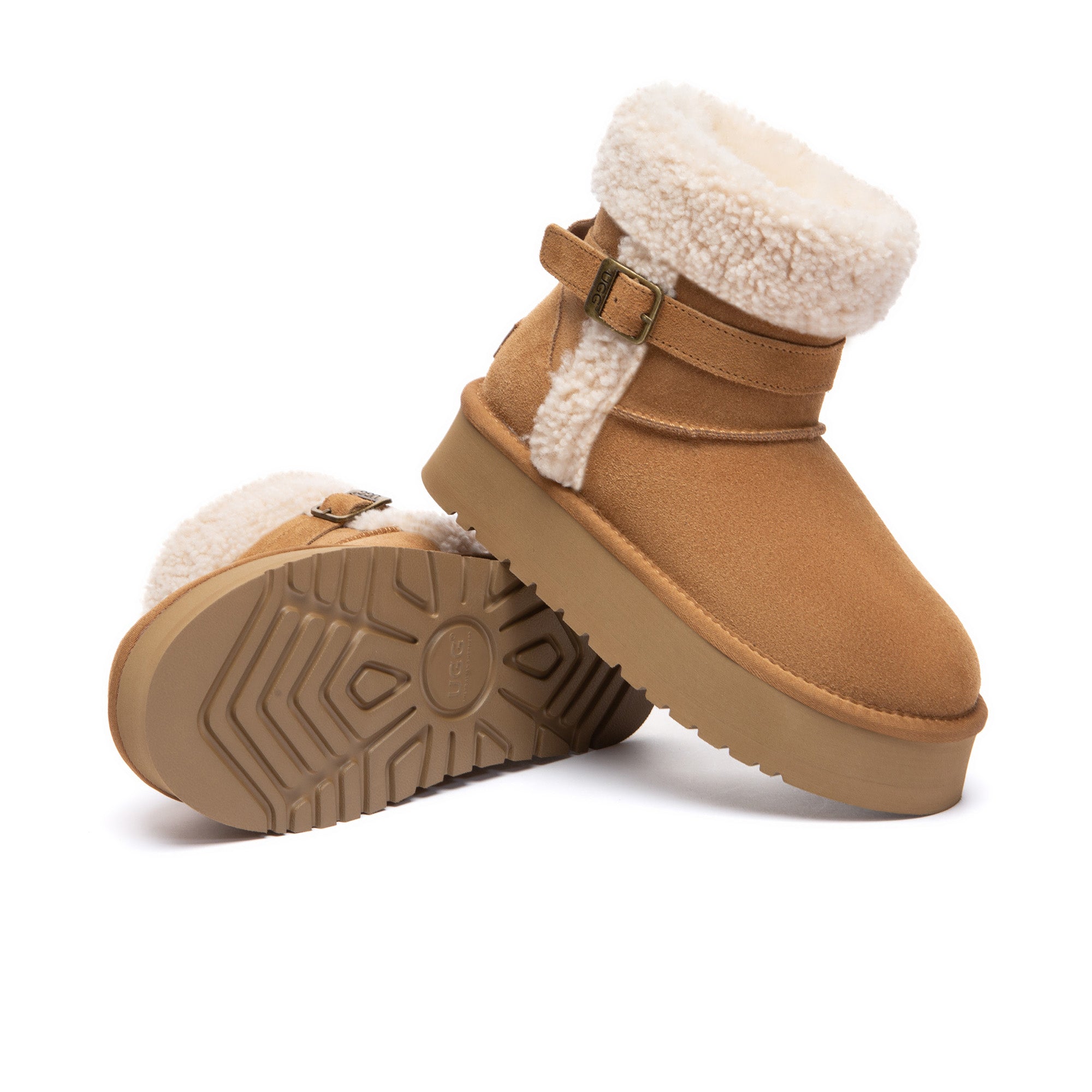 EverUgg Nordic Buckle Strap Mini UGG Boots with decorative buckles and cozy shearling lining, ideal for cold weather footwear.