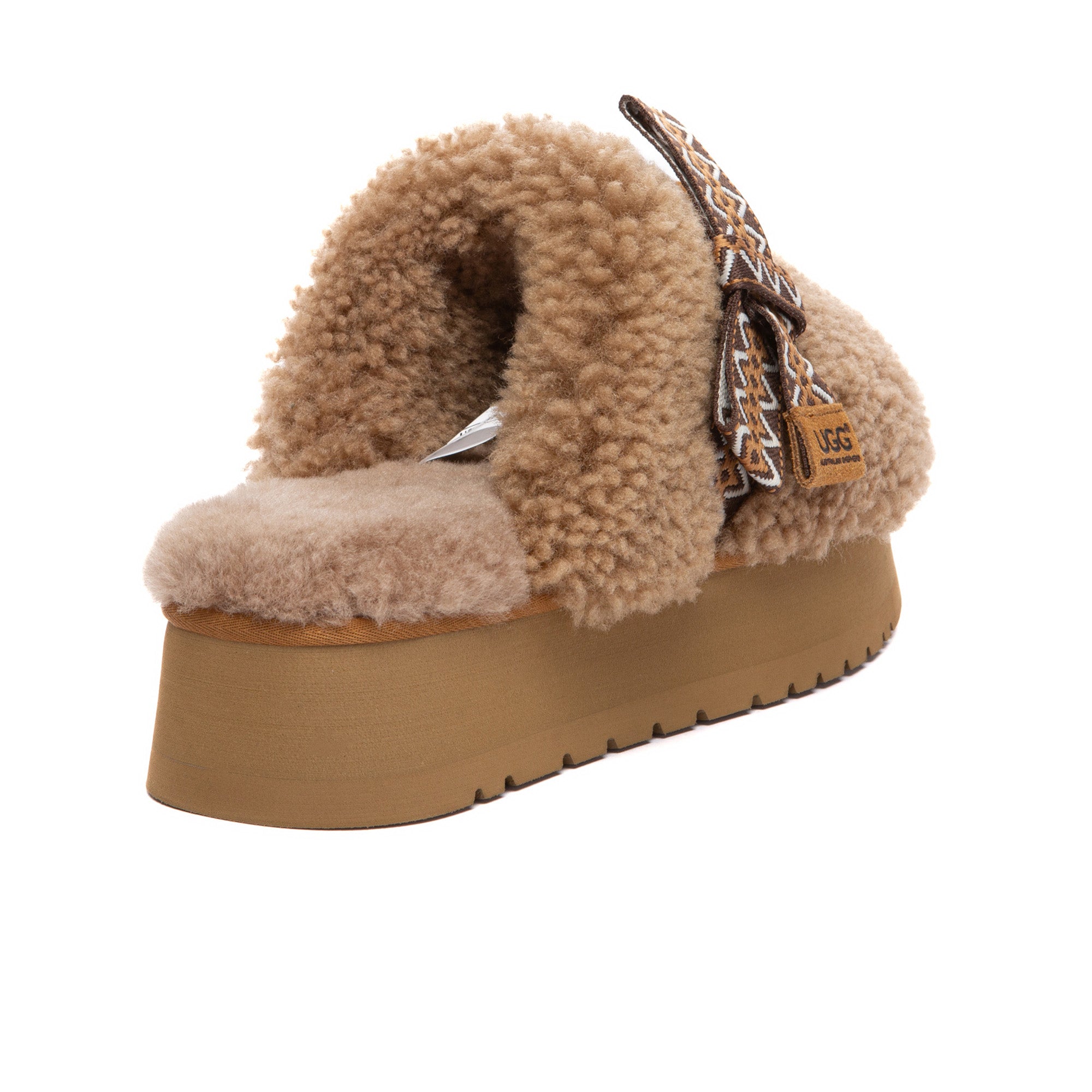 EverUgg PlushCozy Bow Platform UGG slippers featuring soft plush material and a stylish bow detail on the platform sole.