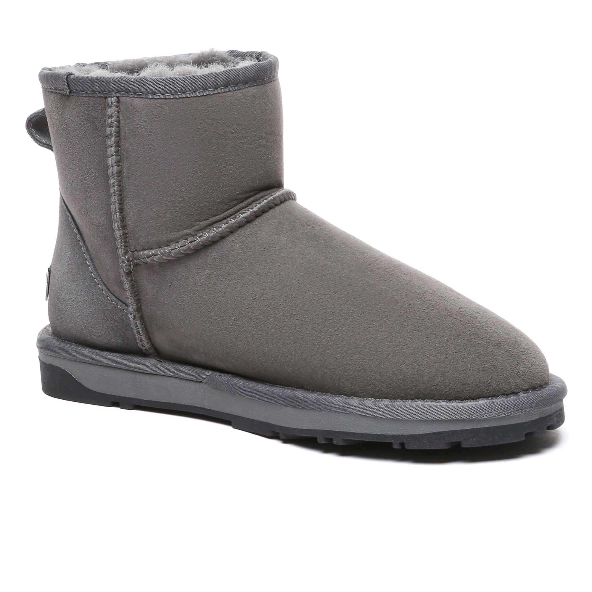 Pair of premium mini classic sheepskin UGG boots for women by EverUgg, featuring soft sheepskin and cozy design.