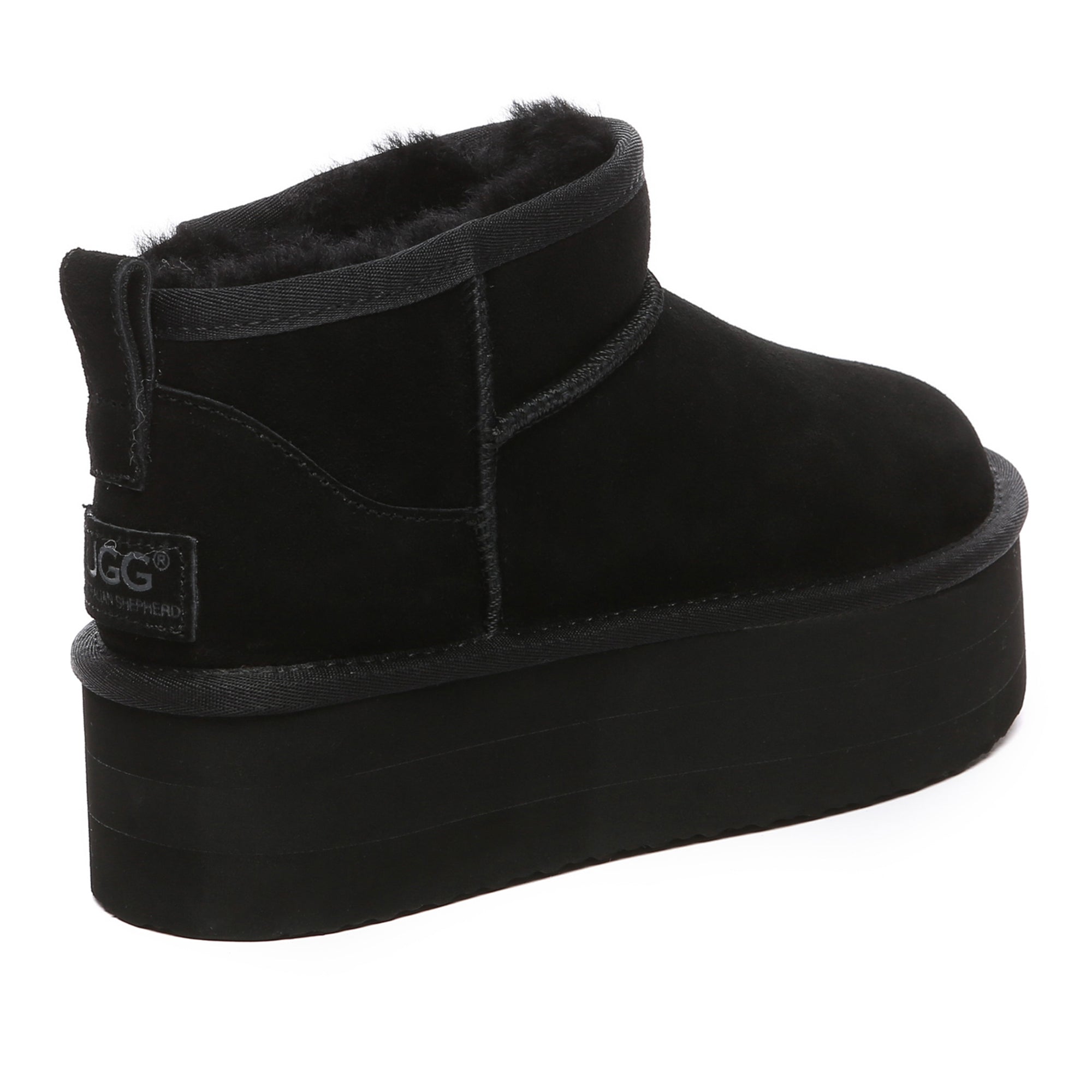 Black EverUgg Ultra Mini Platform UGG Boots with a sleek design and textured sole, perfect for stylish winter wear.