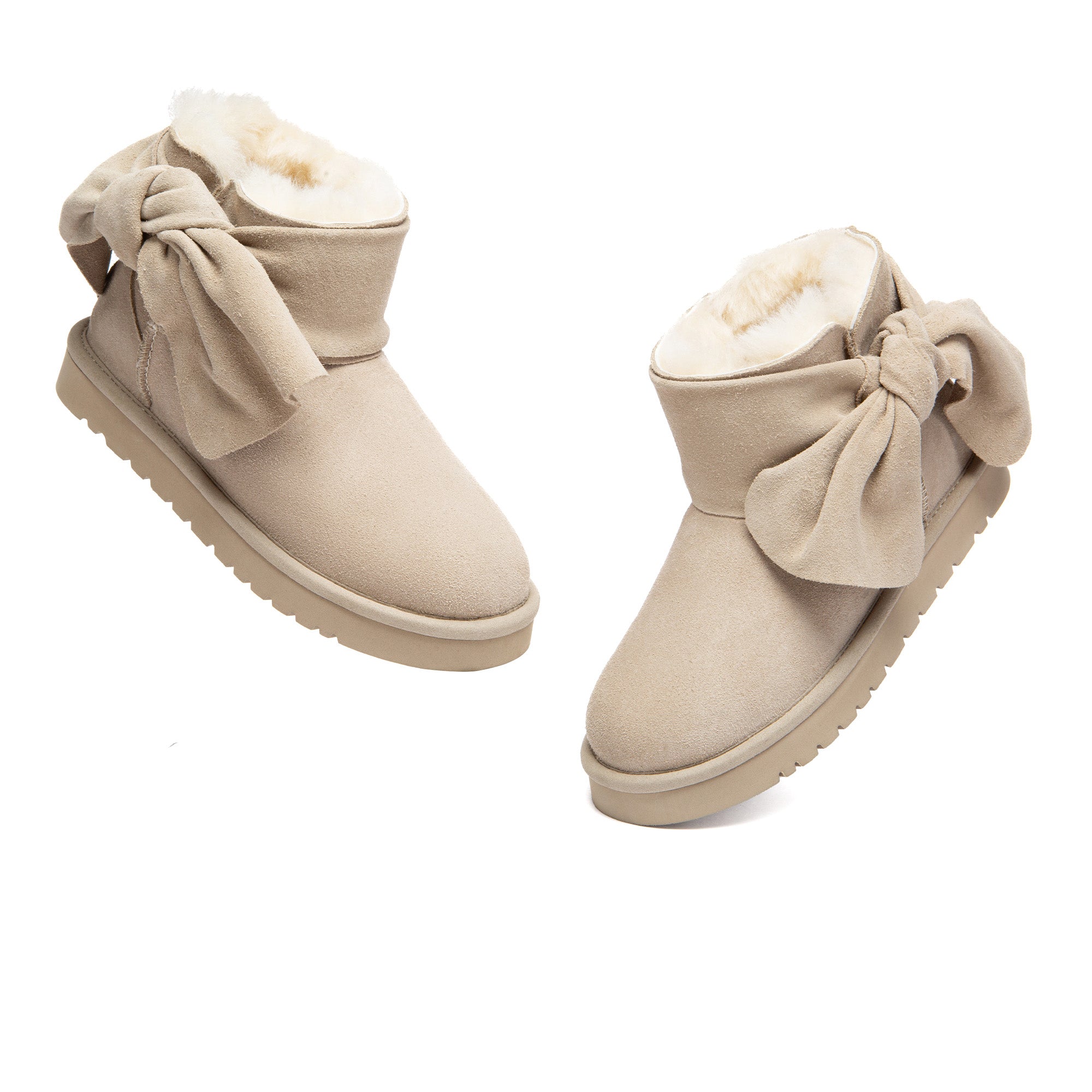 EverUgg Molle UGG boots with plush lining and rugged design, shown in a close-up of the boot's side and sole.