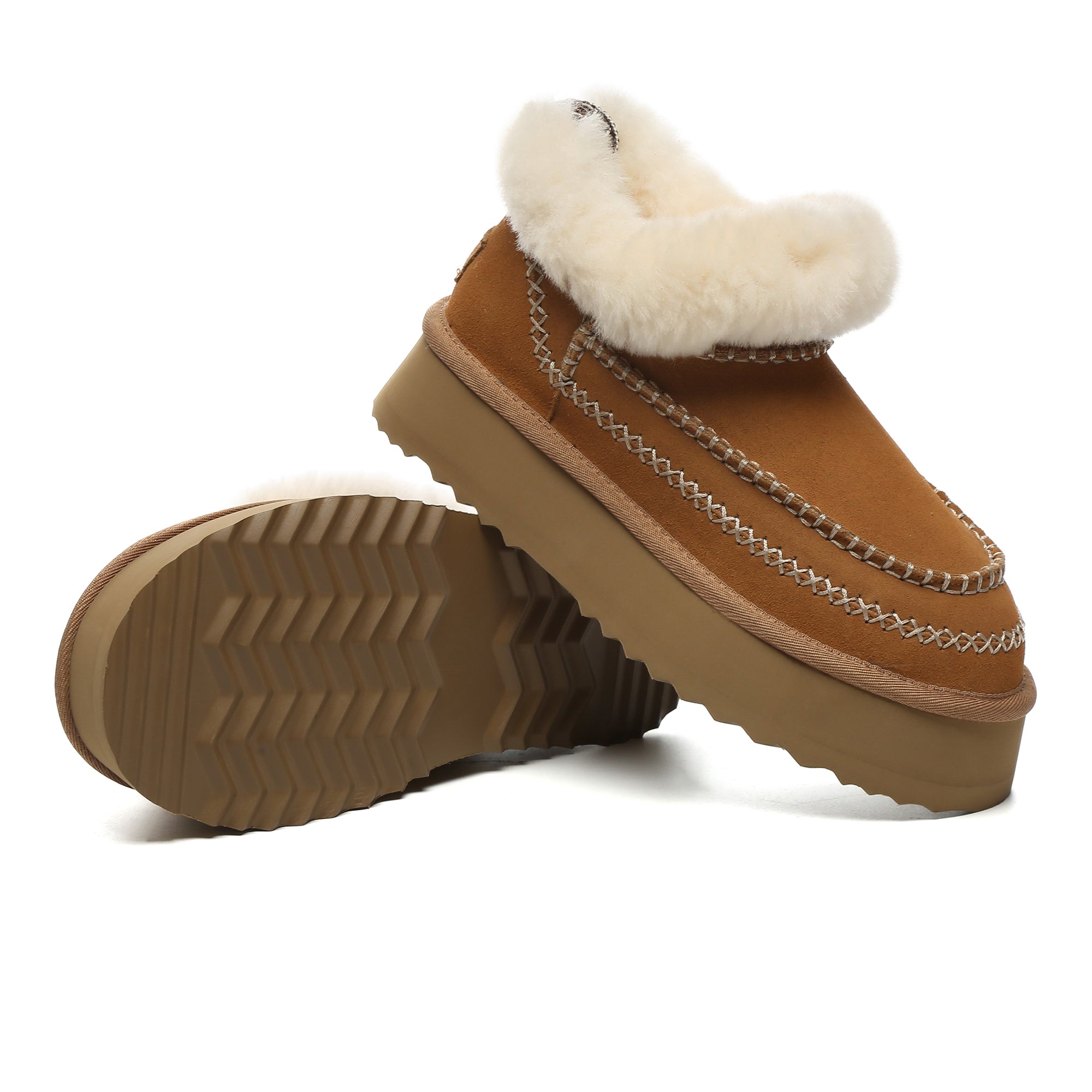 EverUgg Santana Stitch UGG Mini Ankle Platform Slippers in beige with plush lining and stitched design, worn on a woman’s feet.