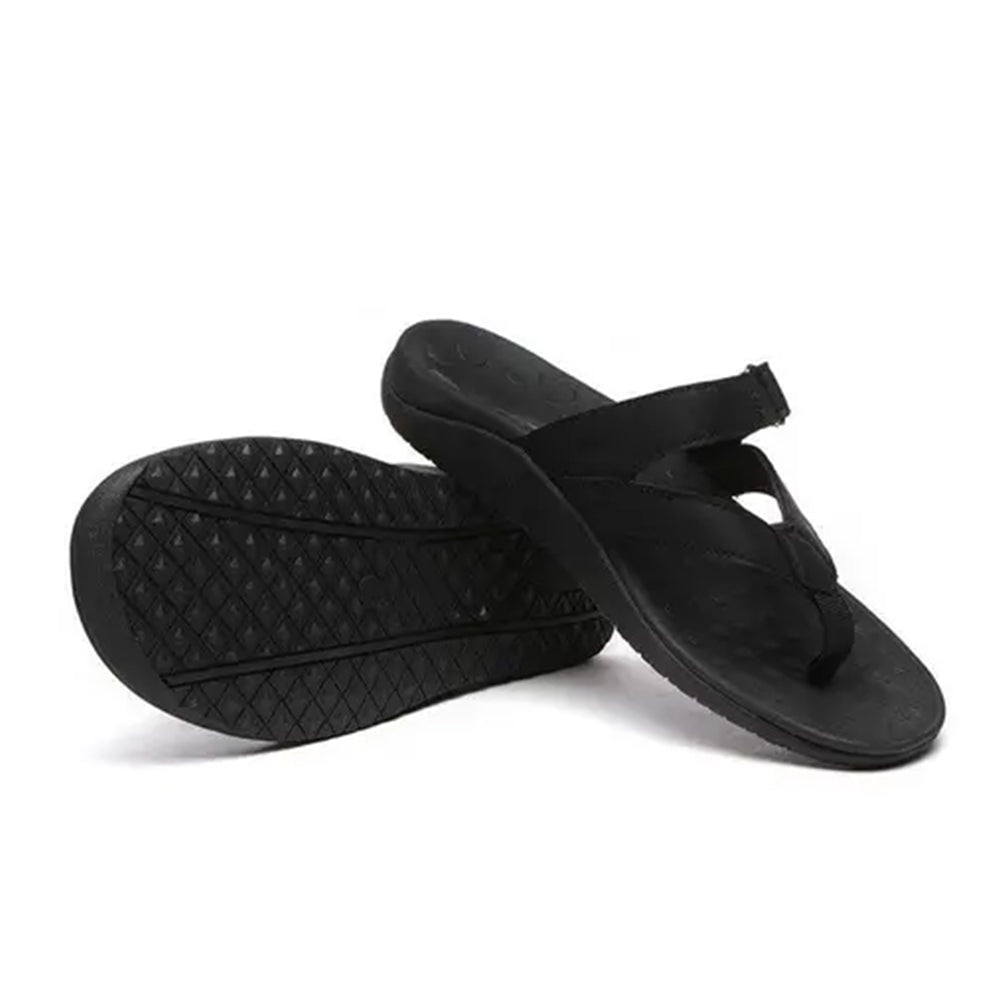 Black EverUgg Short Classic Suede UGG Boots with rounded toe and flat sole, showcasing stylish winter footwear.