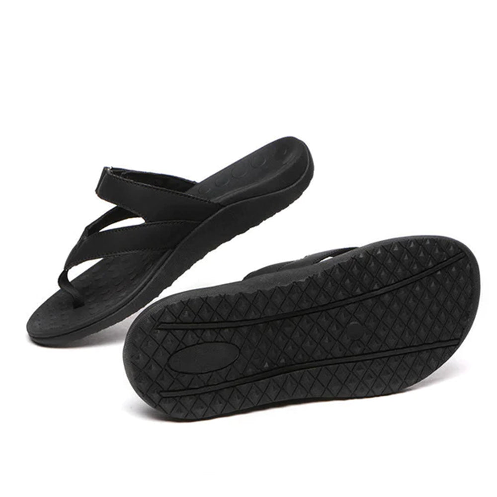 Black EverUgg short classic suede UGG boots with a sleek design and soft suede texture, shown on a plain background.