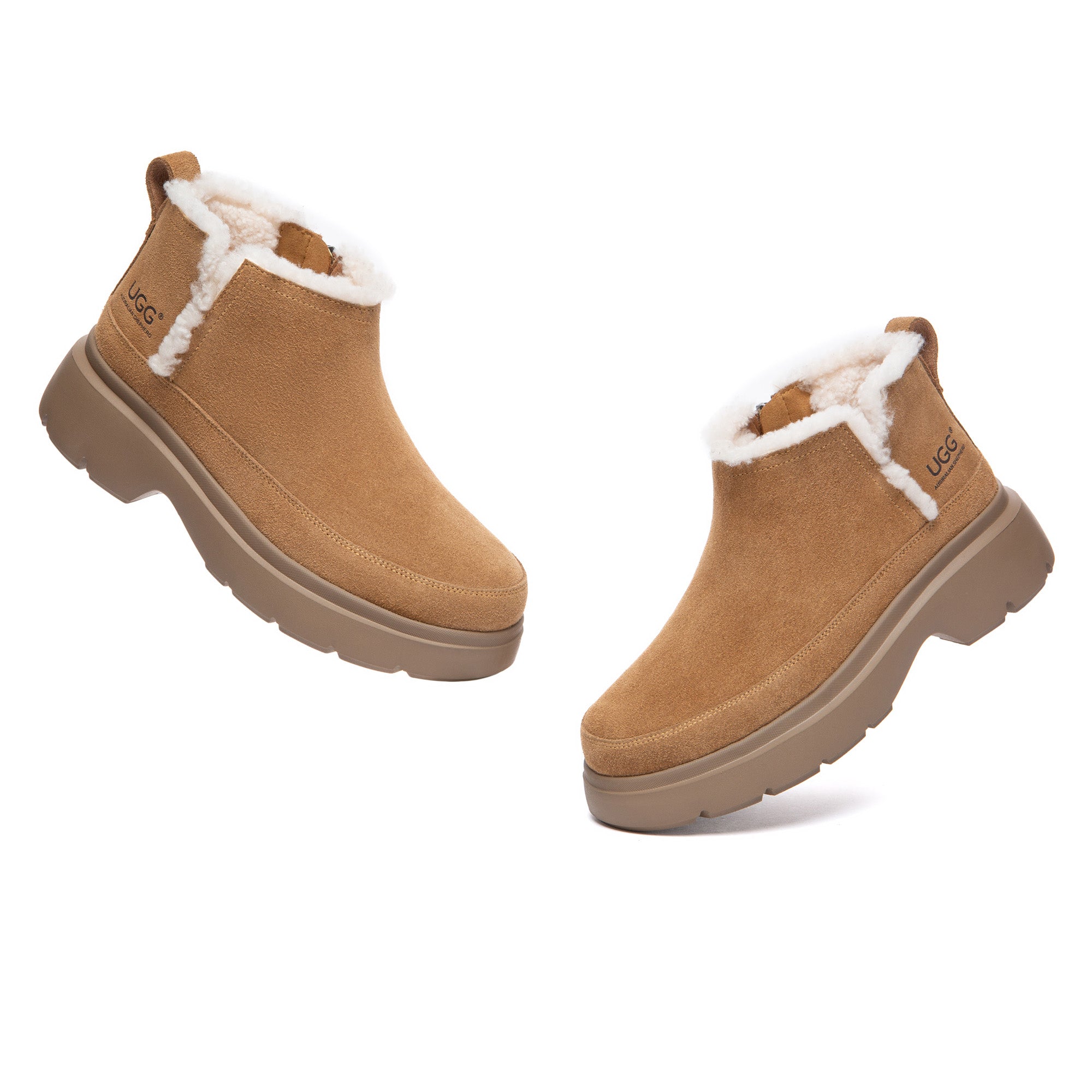 EverUgg Slit Zip Outdoor Platform UGG Boots showing black UGG boots with slit design and platform sole in a natural outdoor setting.