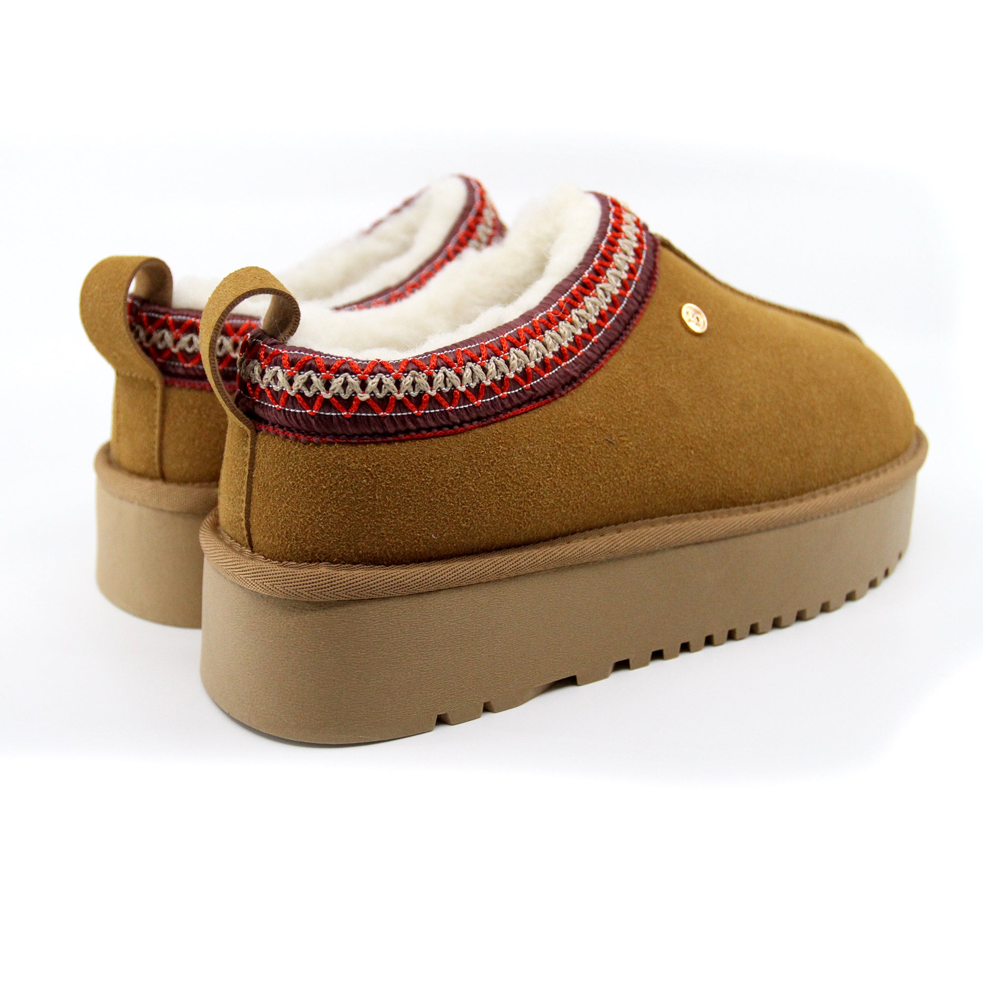 Snuggyz Alpine Platform UGG slippers for women, featuring a cozy plush interior and platform sole, in a stylish chest color.