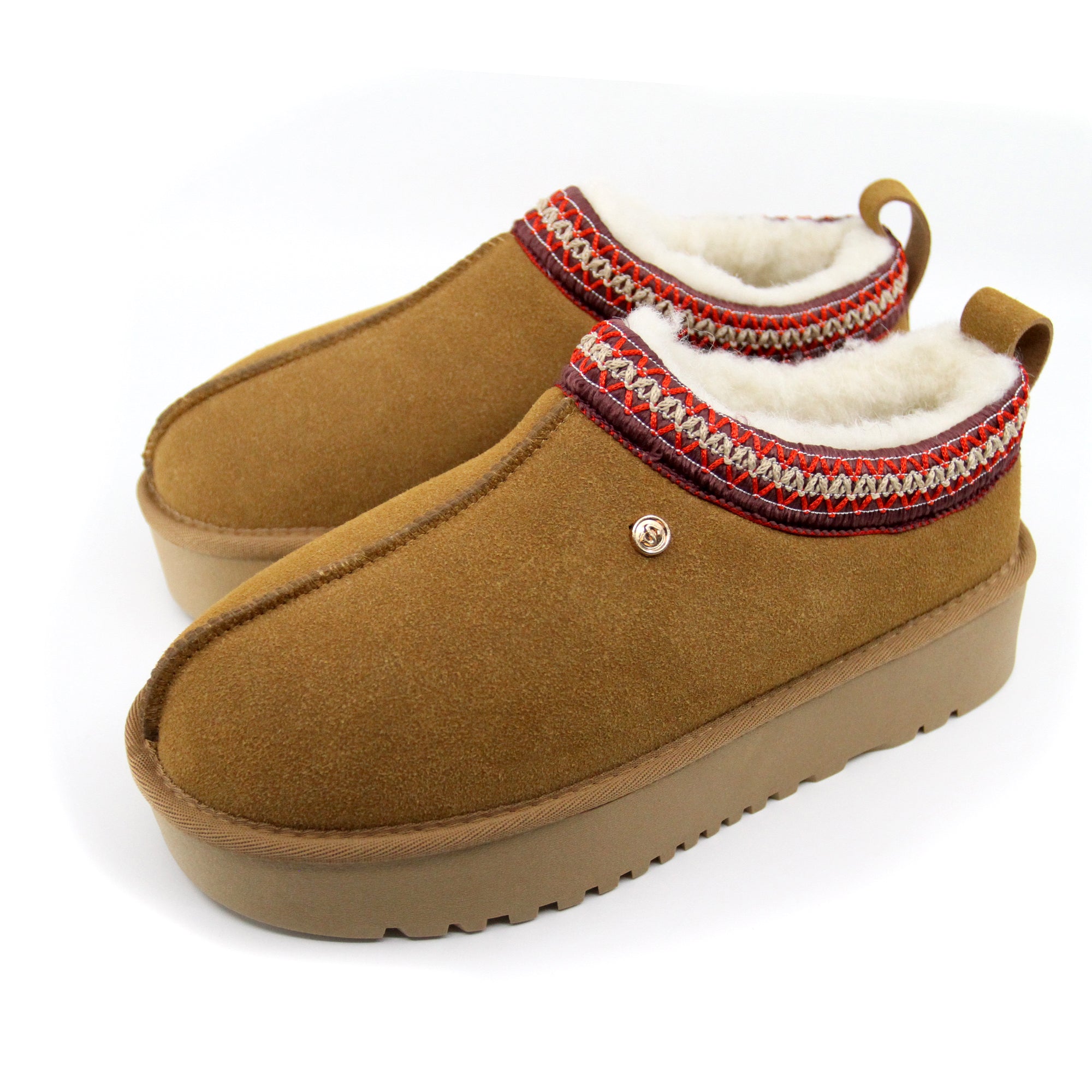 Snuggyz Alpine Platform UGG slippers for women, featuring plush fur lining and sturdy platform sole, shown from a side angle.