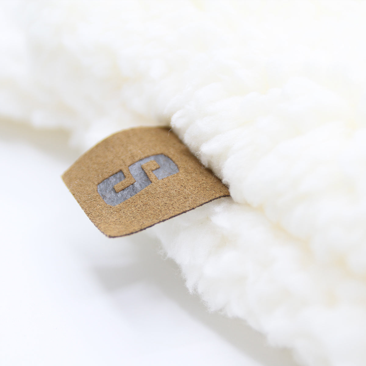 Snuggyz® Baby Swaddle Wrap Blanket with soft fabric and cozy design, perfect for snugging a newborn baby.