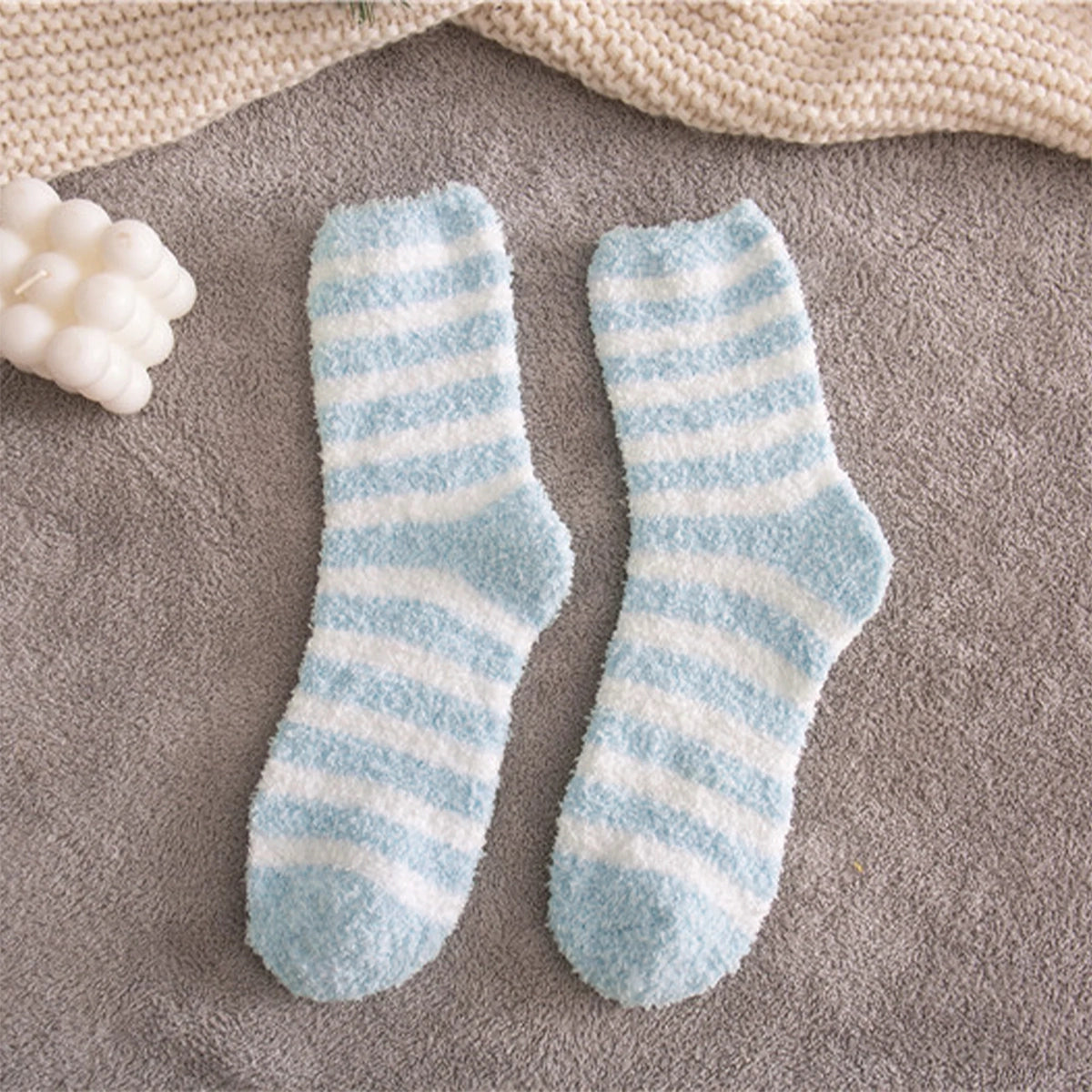 Blue striped Snuggyz Ultra Soft Socks with comfortable fit and cozy fabric, perfect for casual wear.