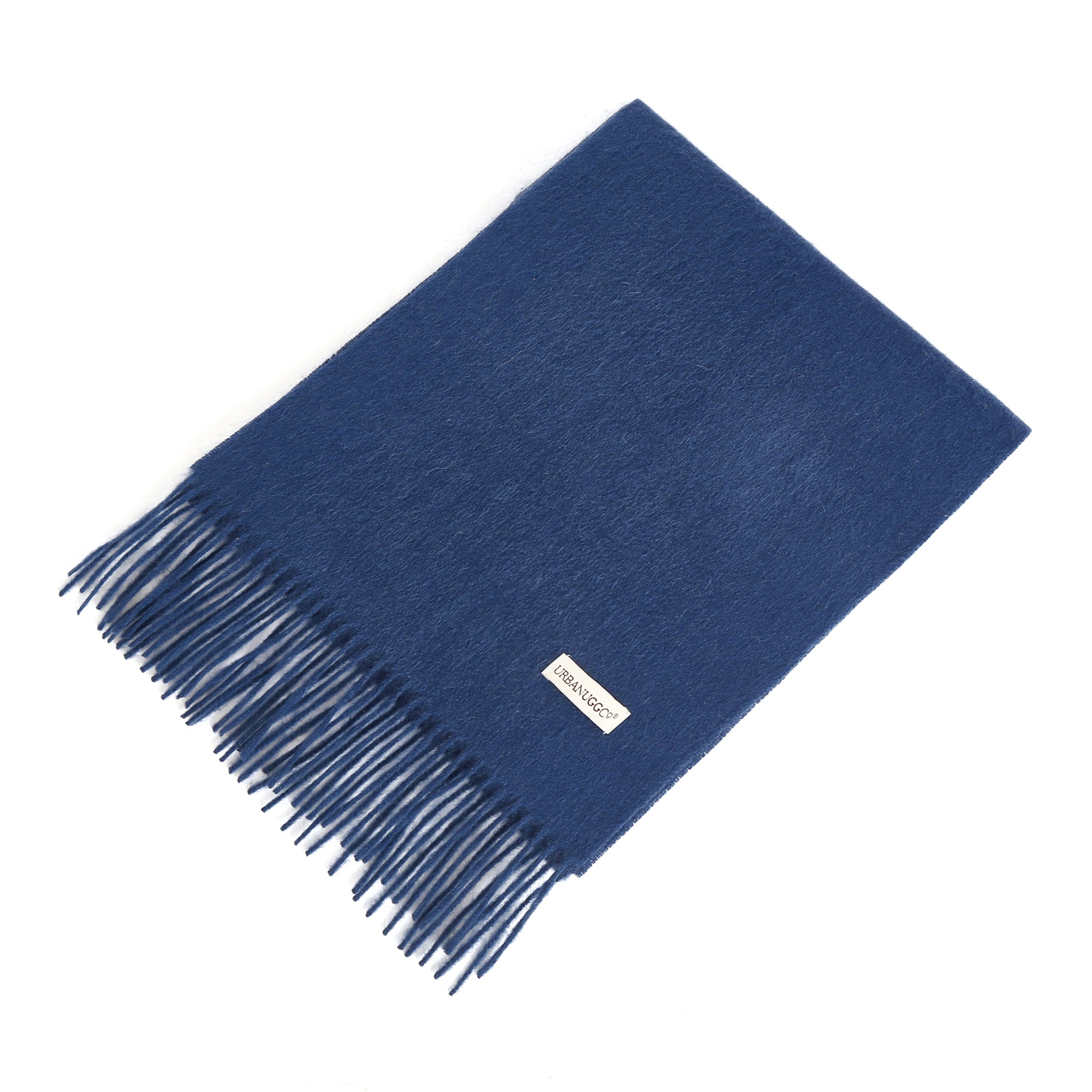 EverUgg tassel wool scarf with fringe, soft and cozy, draped over neutral background, showcasing warm winter accessory.